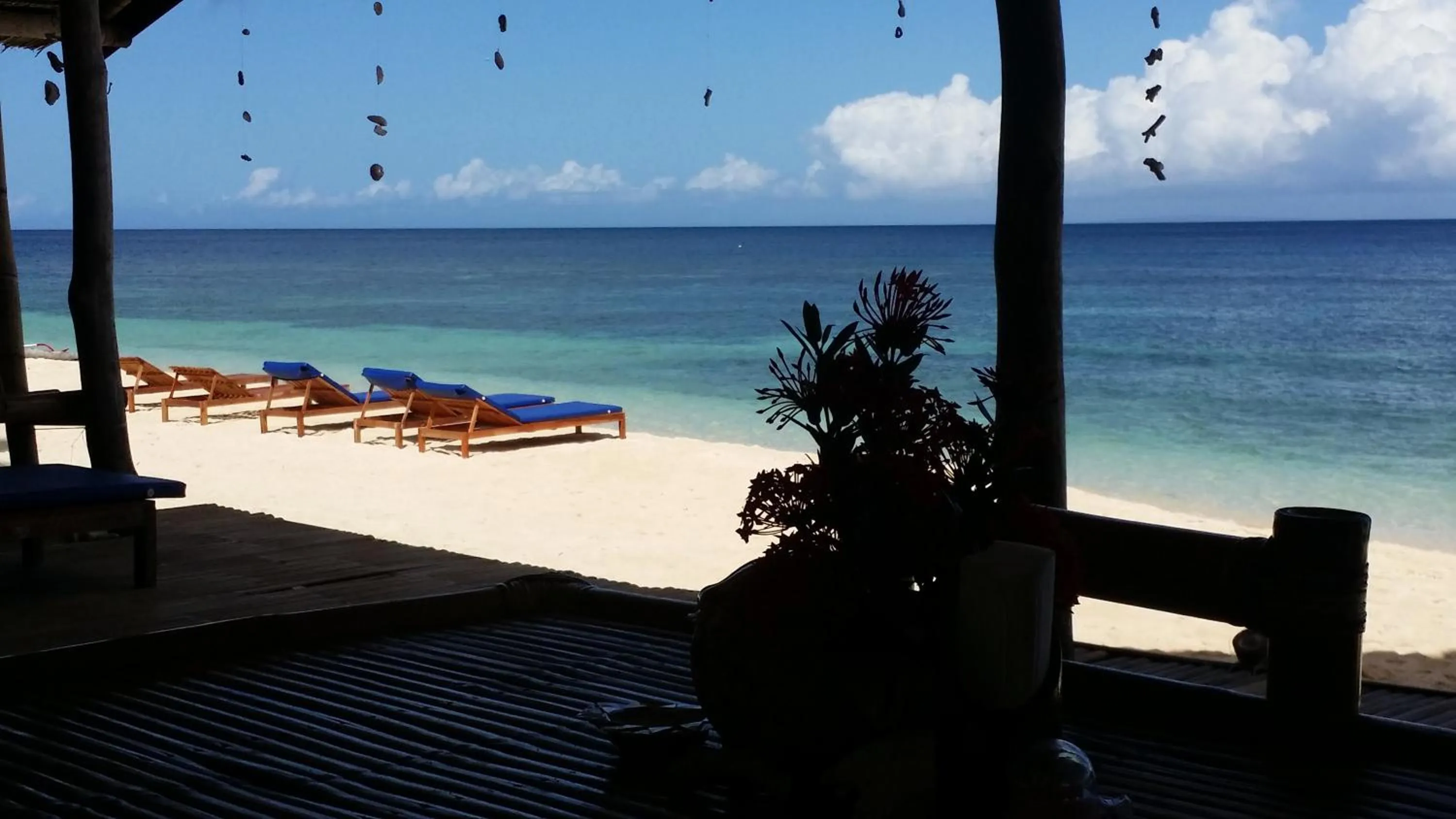 Seating area in White Beach Front and Cottages
