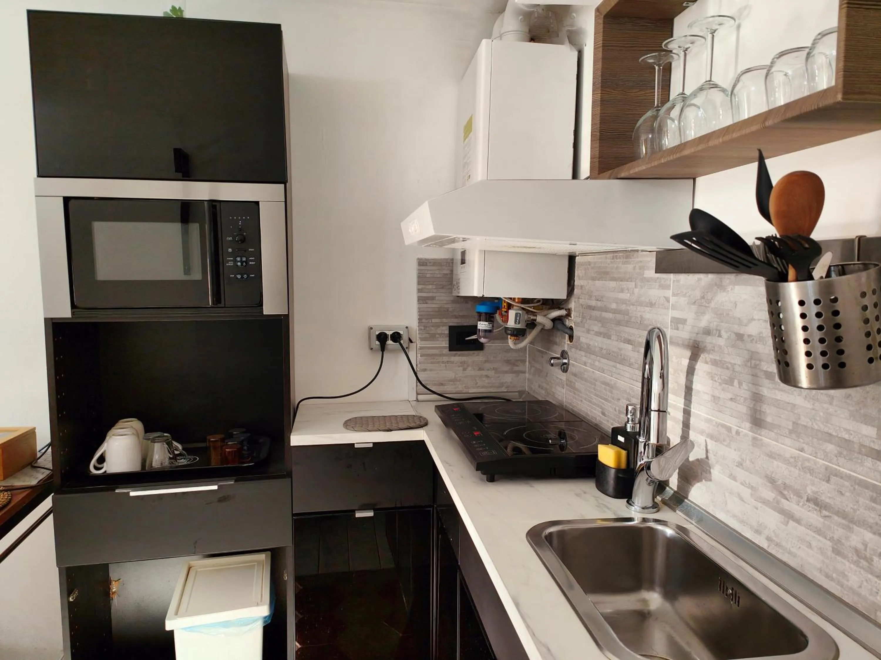 Kitchen or kitchenette in Aparthotel Dei Mercanti