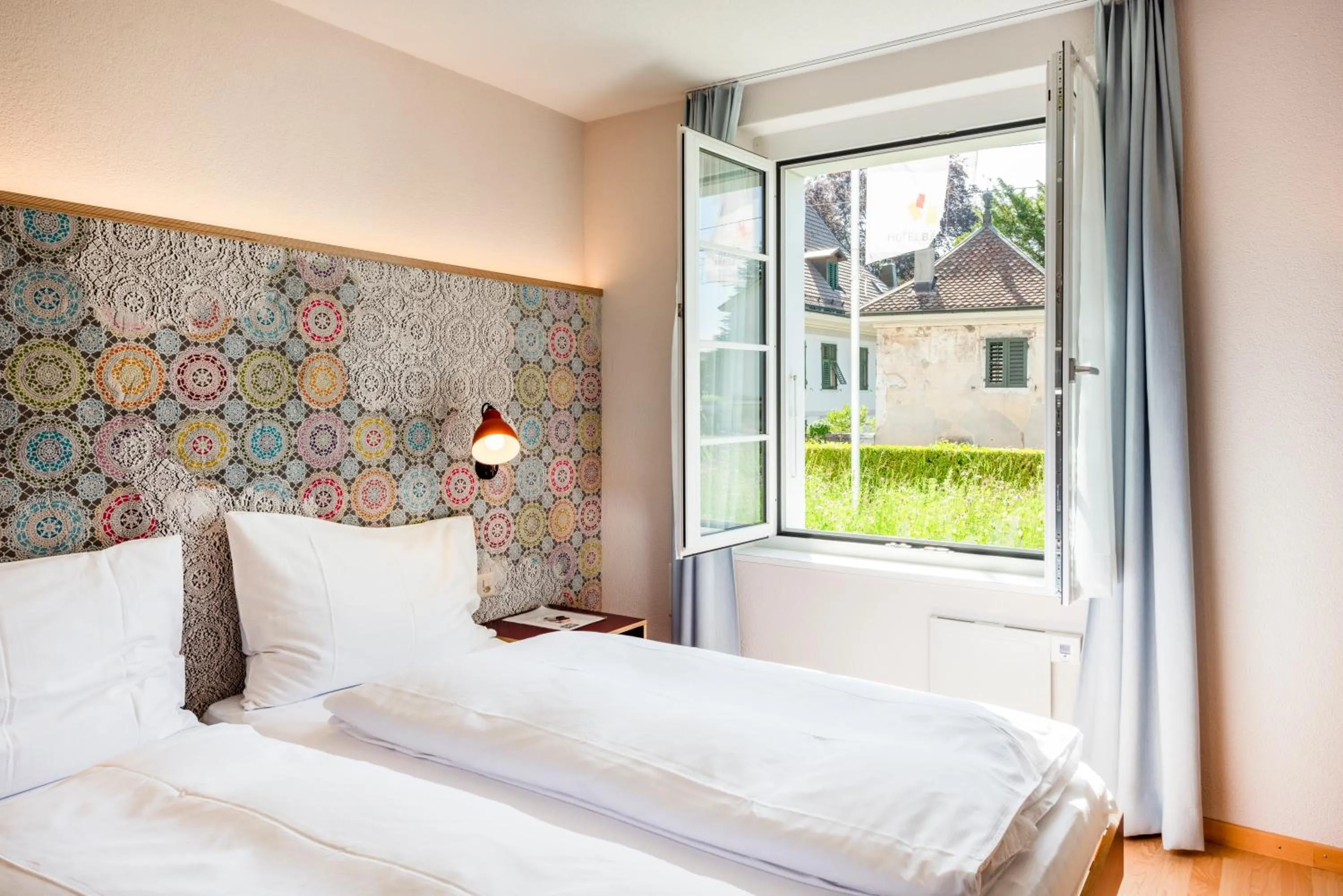 Bed in Bären Self Check-in Hotel