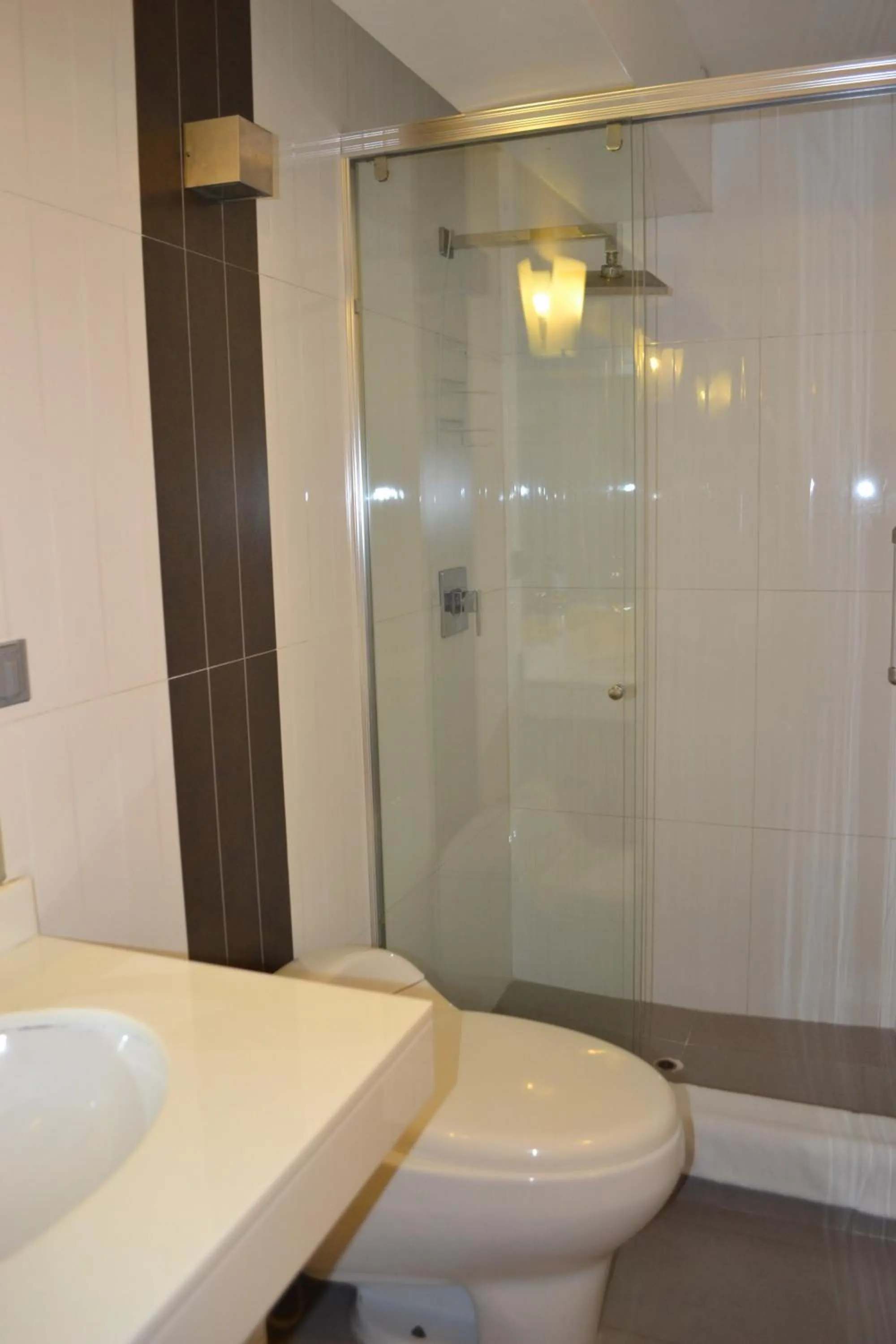 Bathroom in Suite Service Apart Hotel