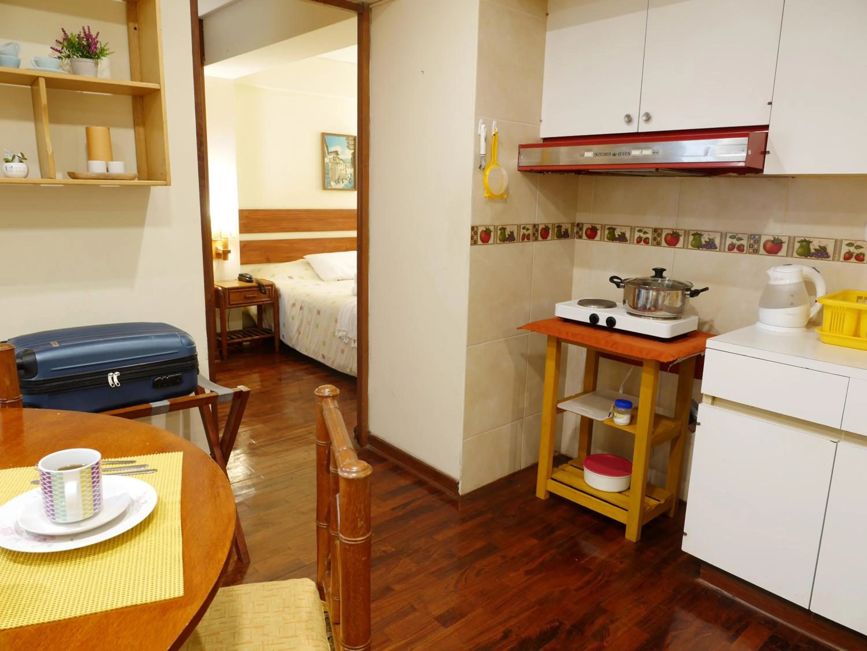 Kitchen or kitchenette in Suite Service Apart Hotel