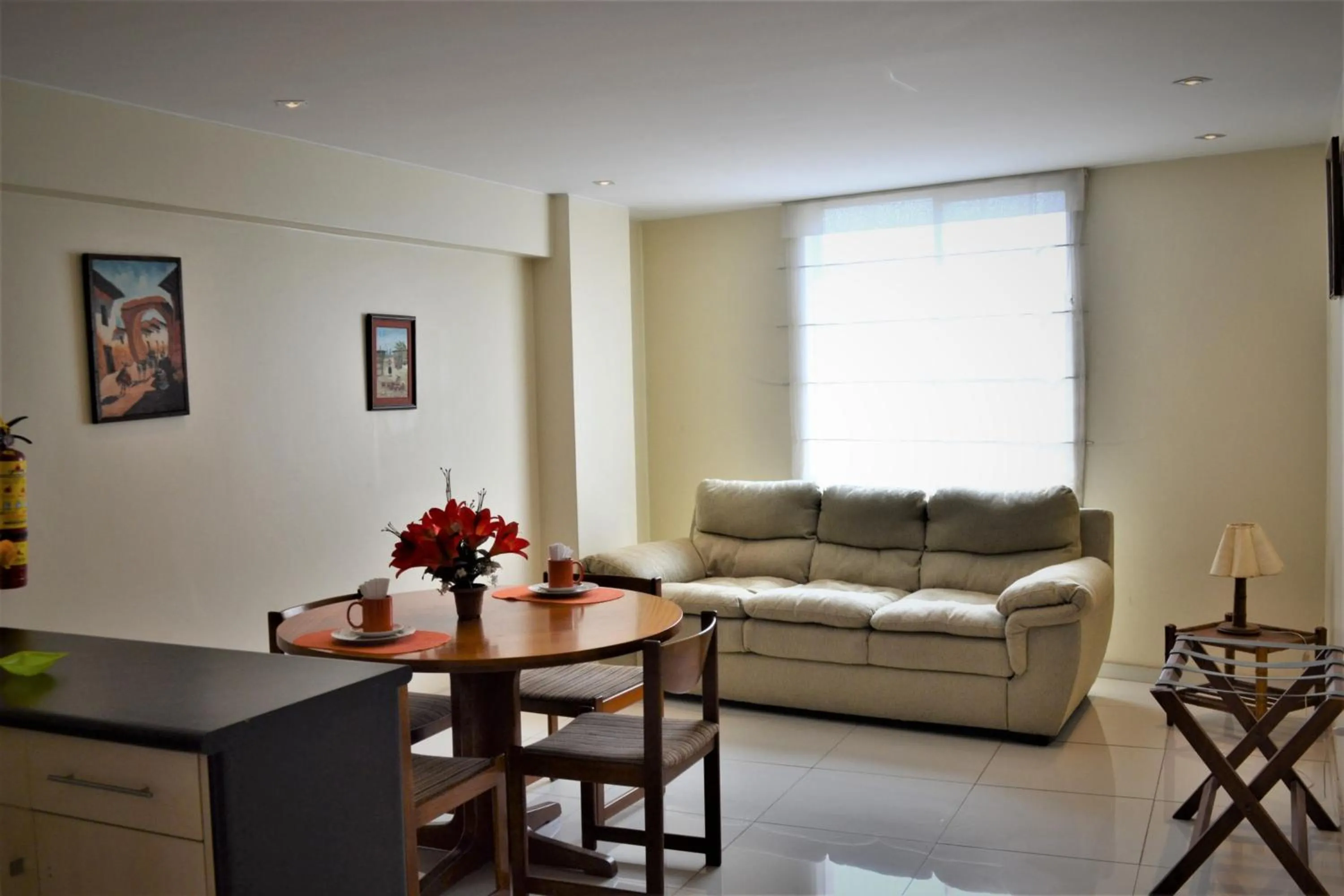 Seating area in Suite Service Apart Hotel