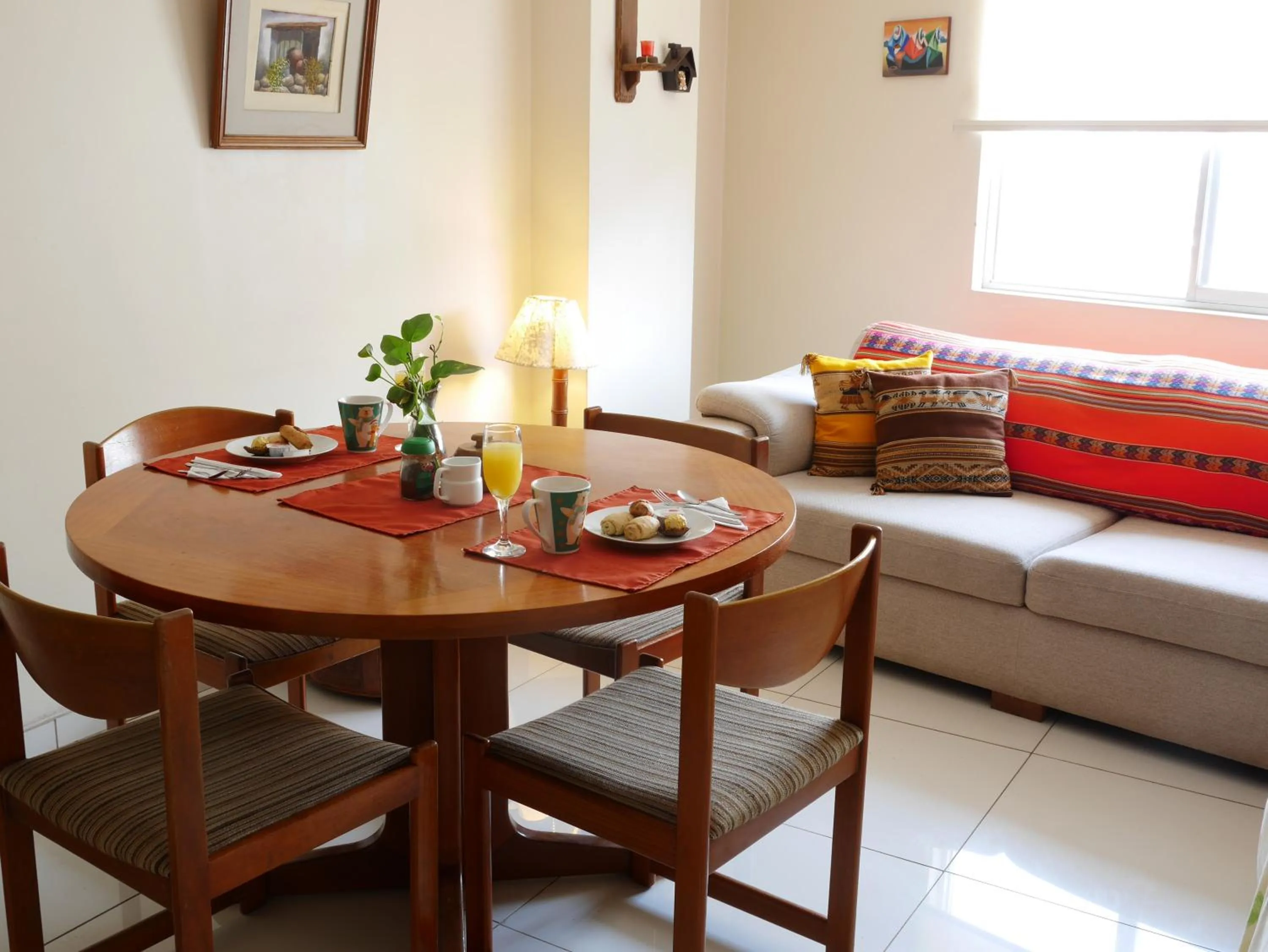 Seating area in Suite Service Apart Hotel