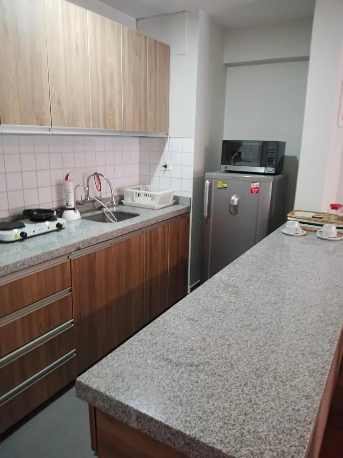 Kitchen or kitchenette in Suite Service Apart Hotel