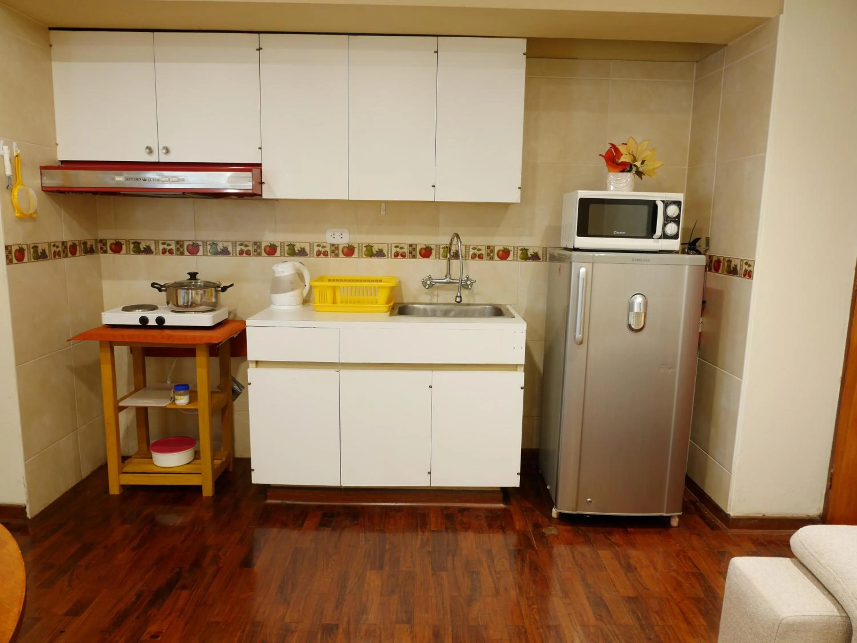 Kitchen or kitchenette in Suite Service Apart Hotel