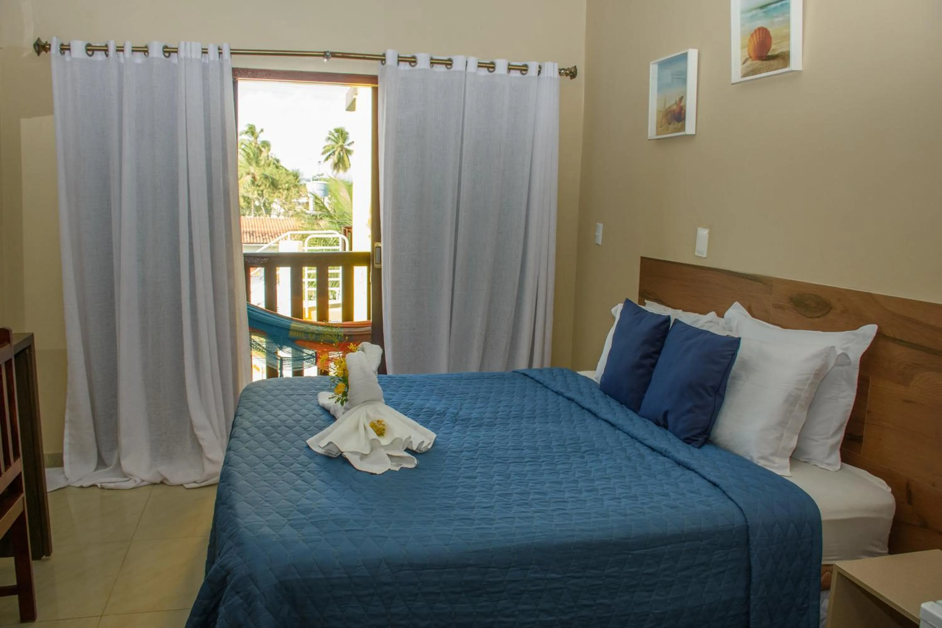 Bed in Pousada Velosmar