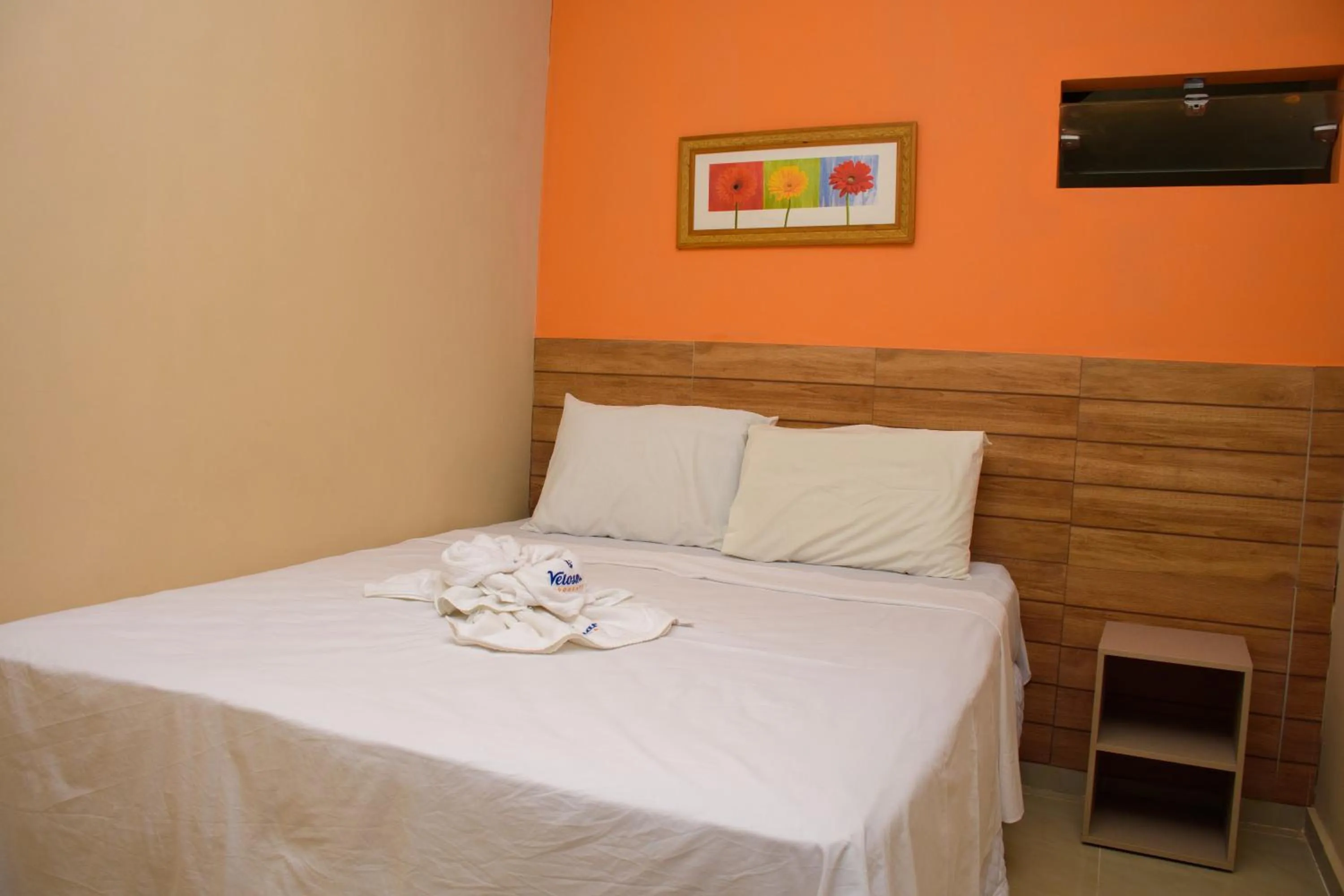 Bed in Pousada Velosmar