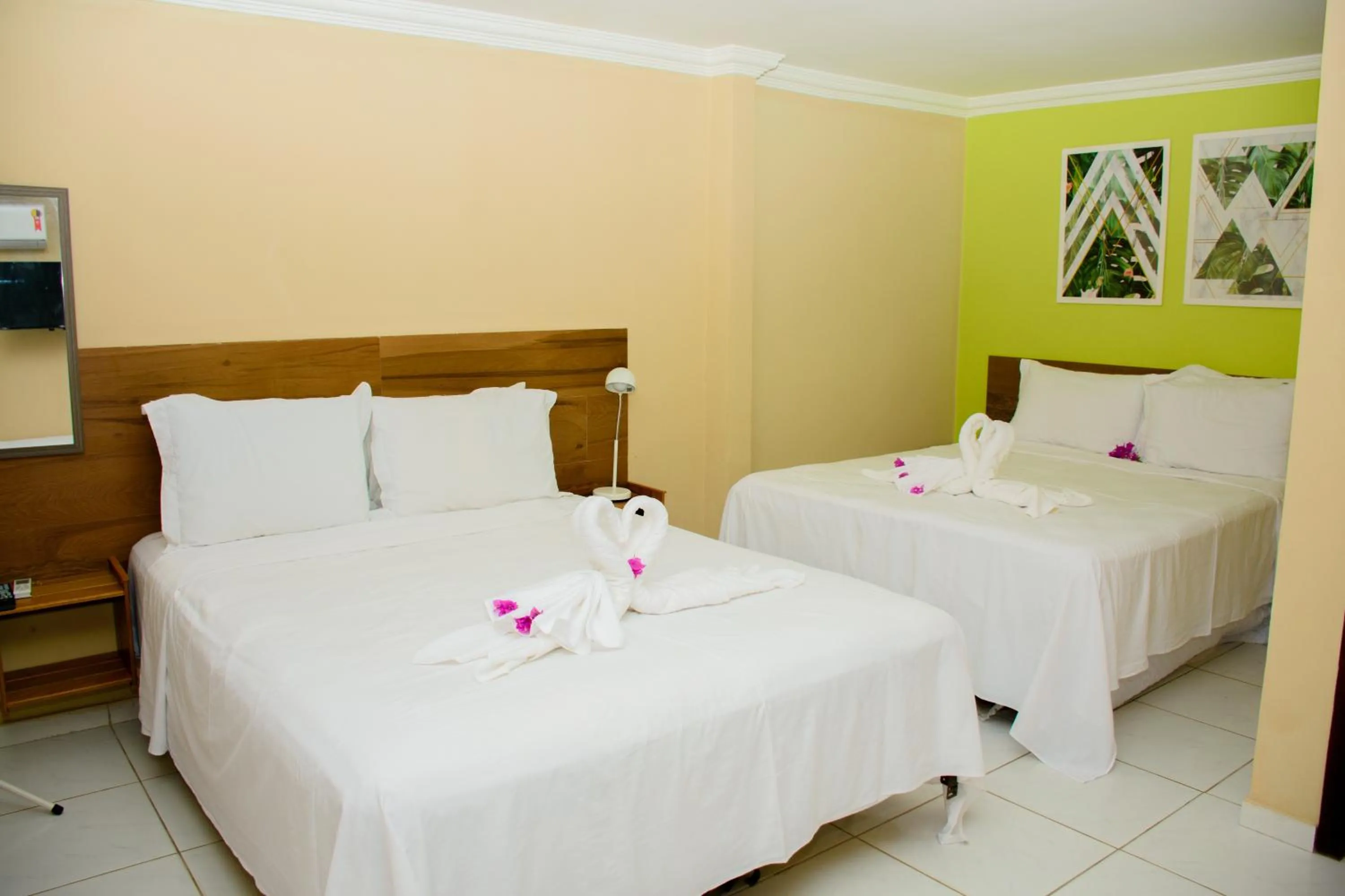 Bed in Pousada Velosmar