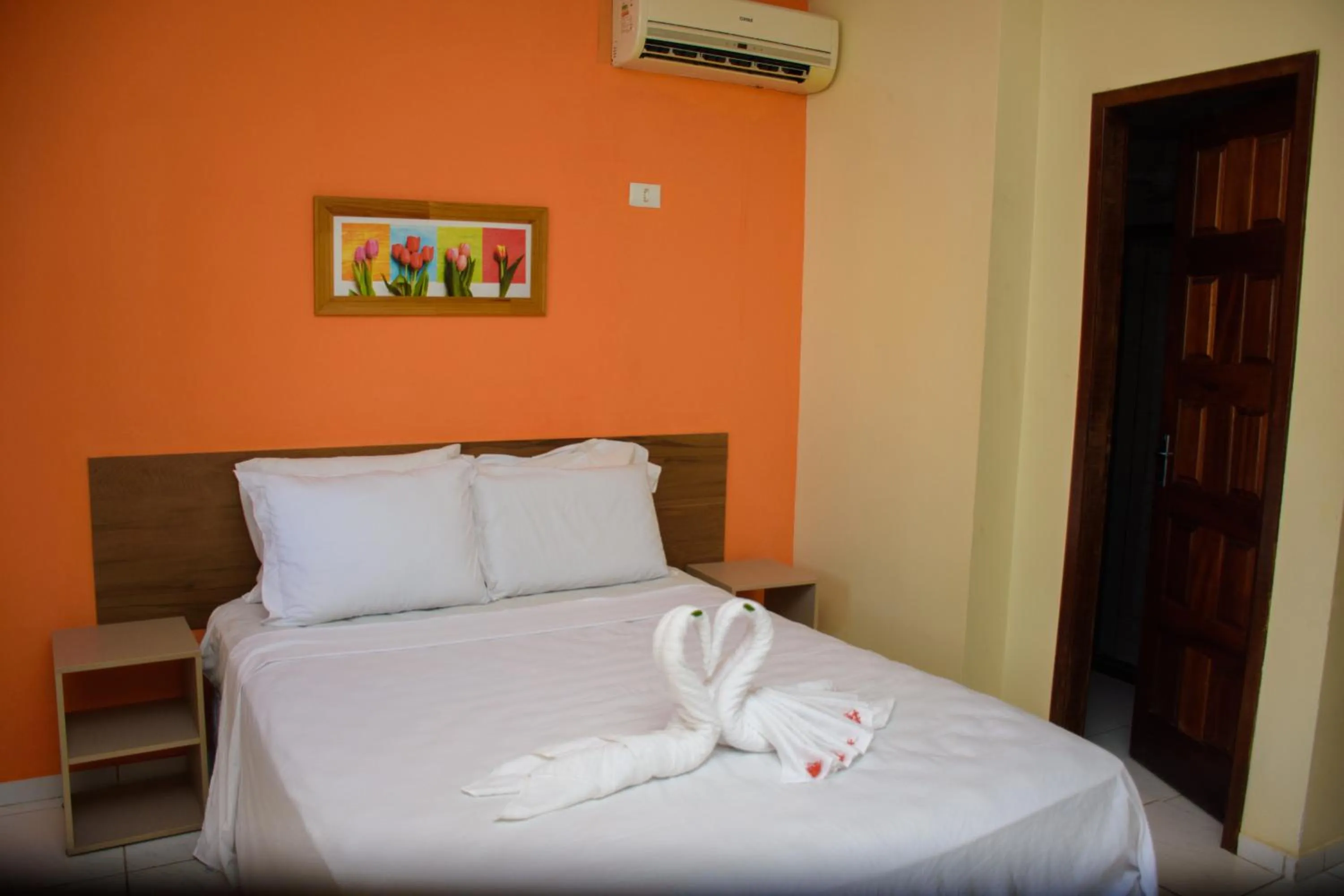 Bed in Pousada Velosmar