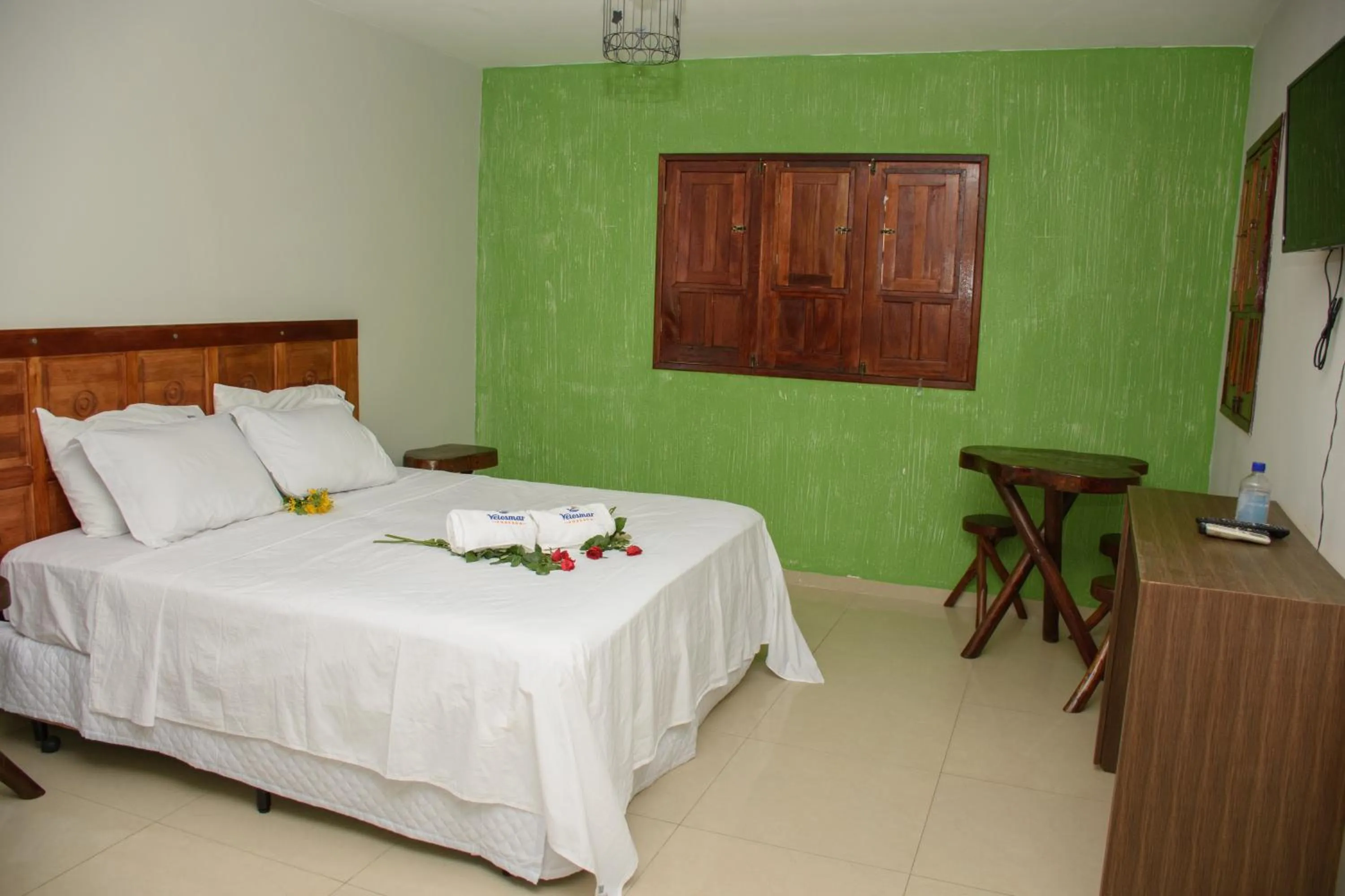 Bed in Pousada Velosmar