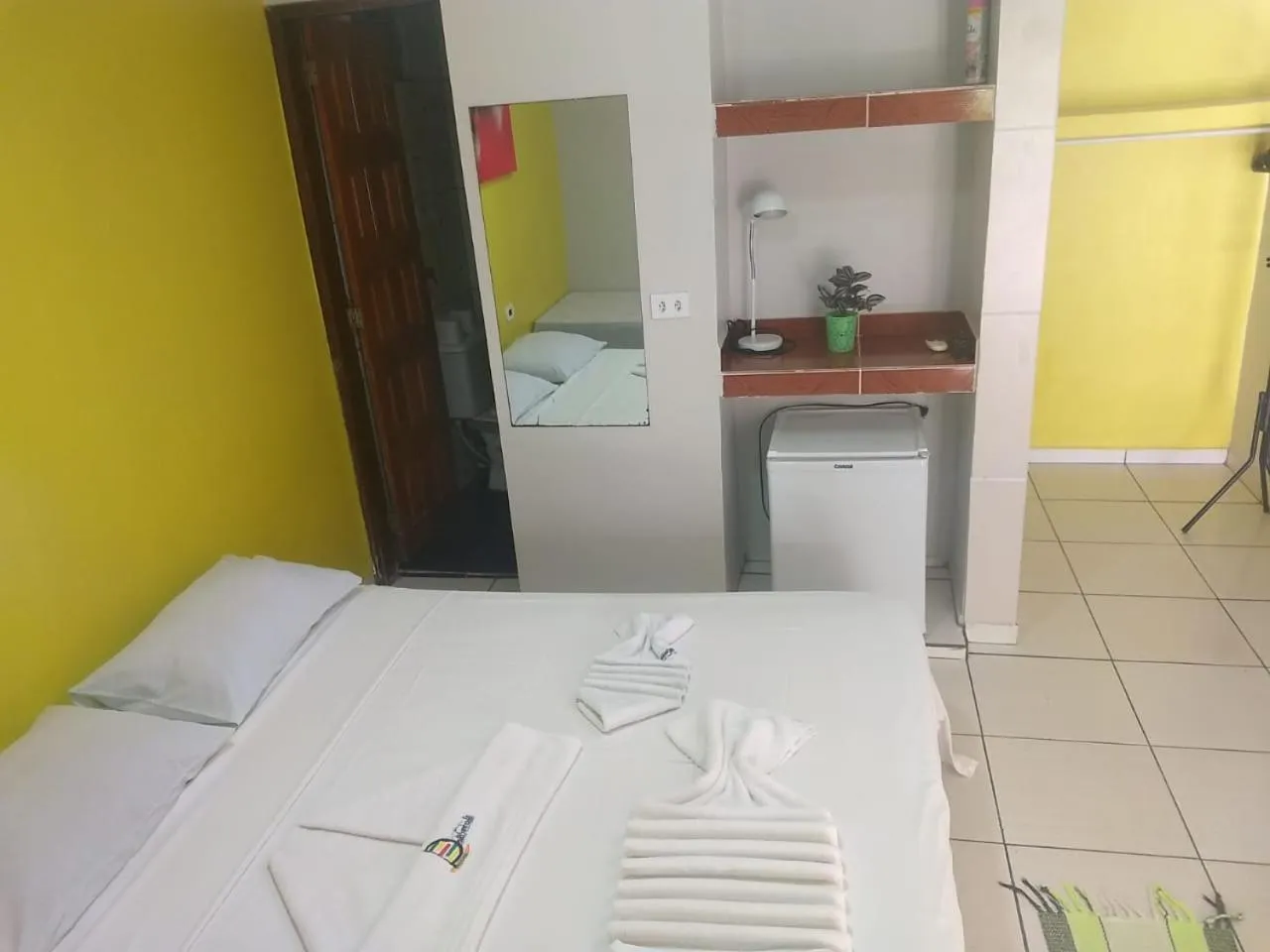 Bed in Pousada Velosmar