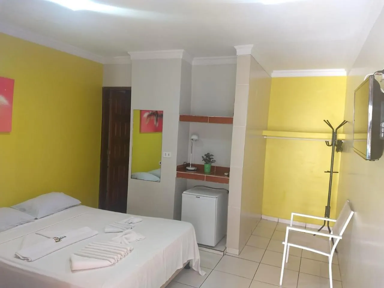 Bed in Pousada Velosmar