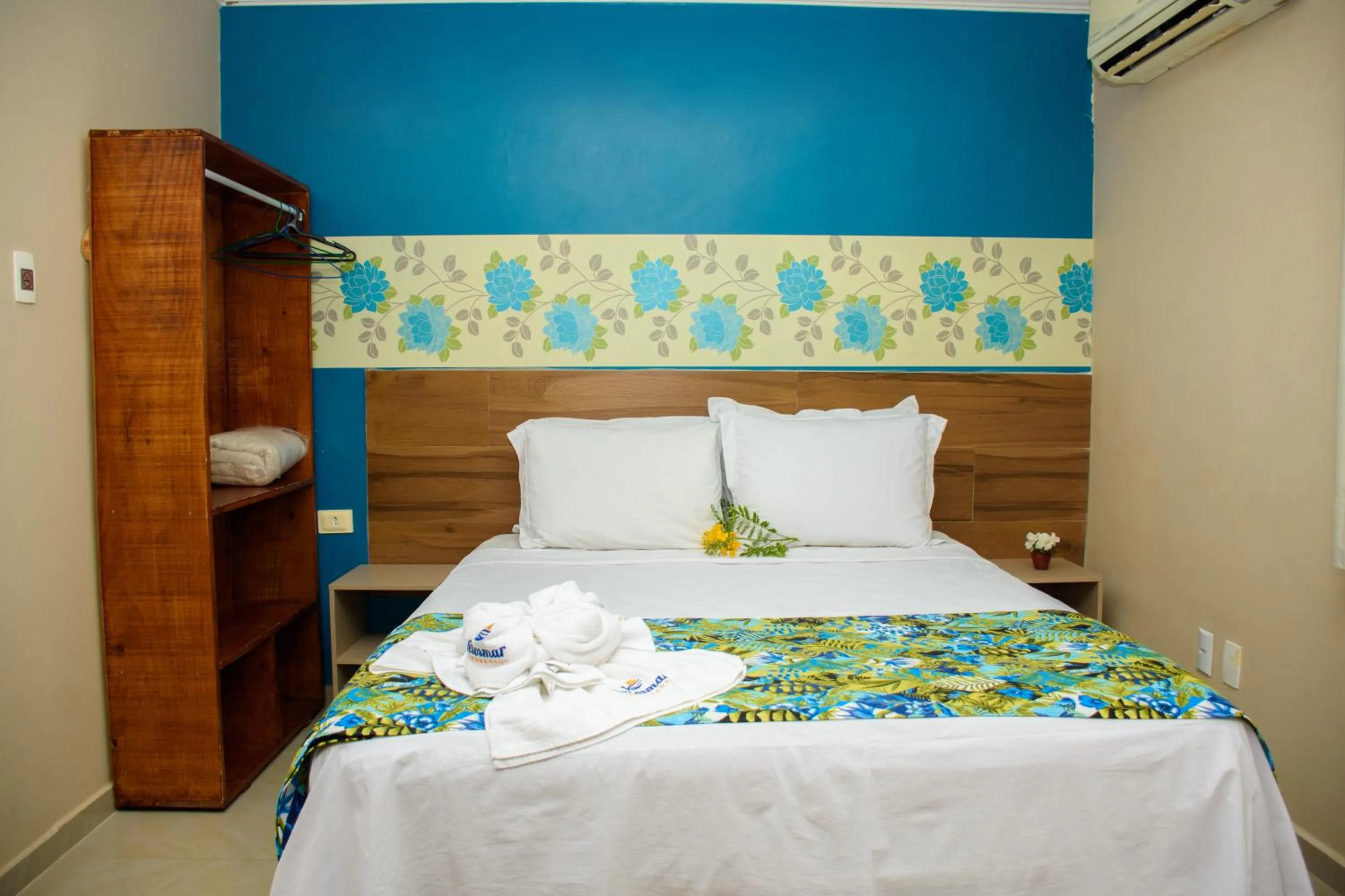 Bed in Pousada Velosmar