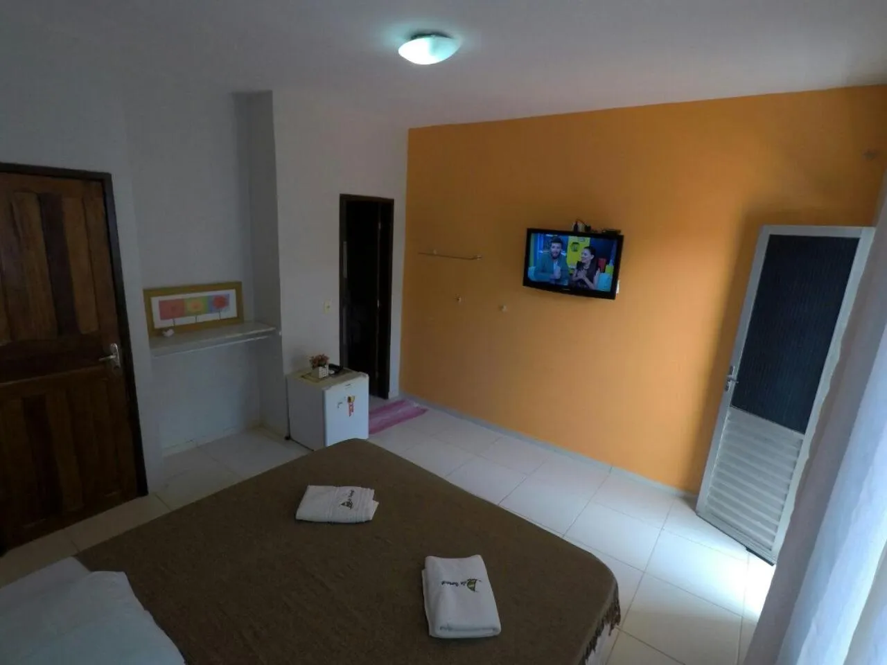 Bed in Pousada Velosmar