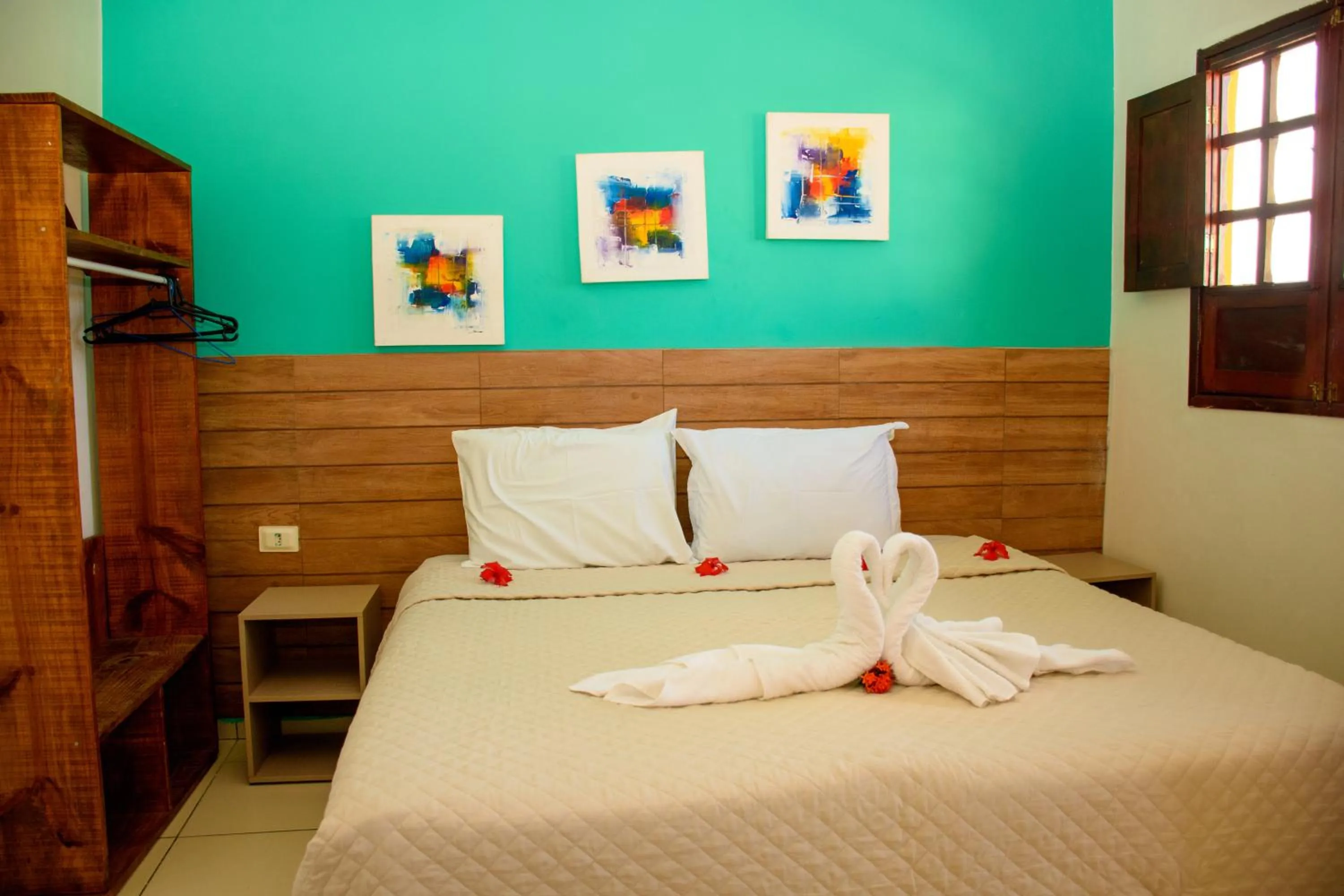 Bed in Pousada Velosmar