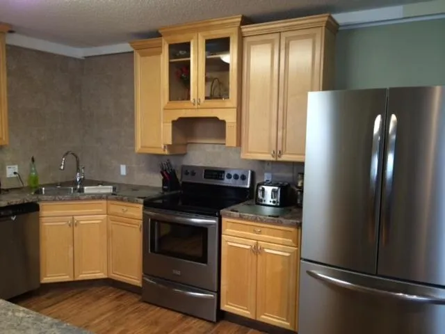 Kitchen or kitchenette in Laura's Lodge