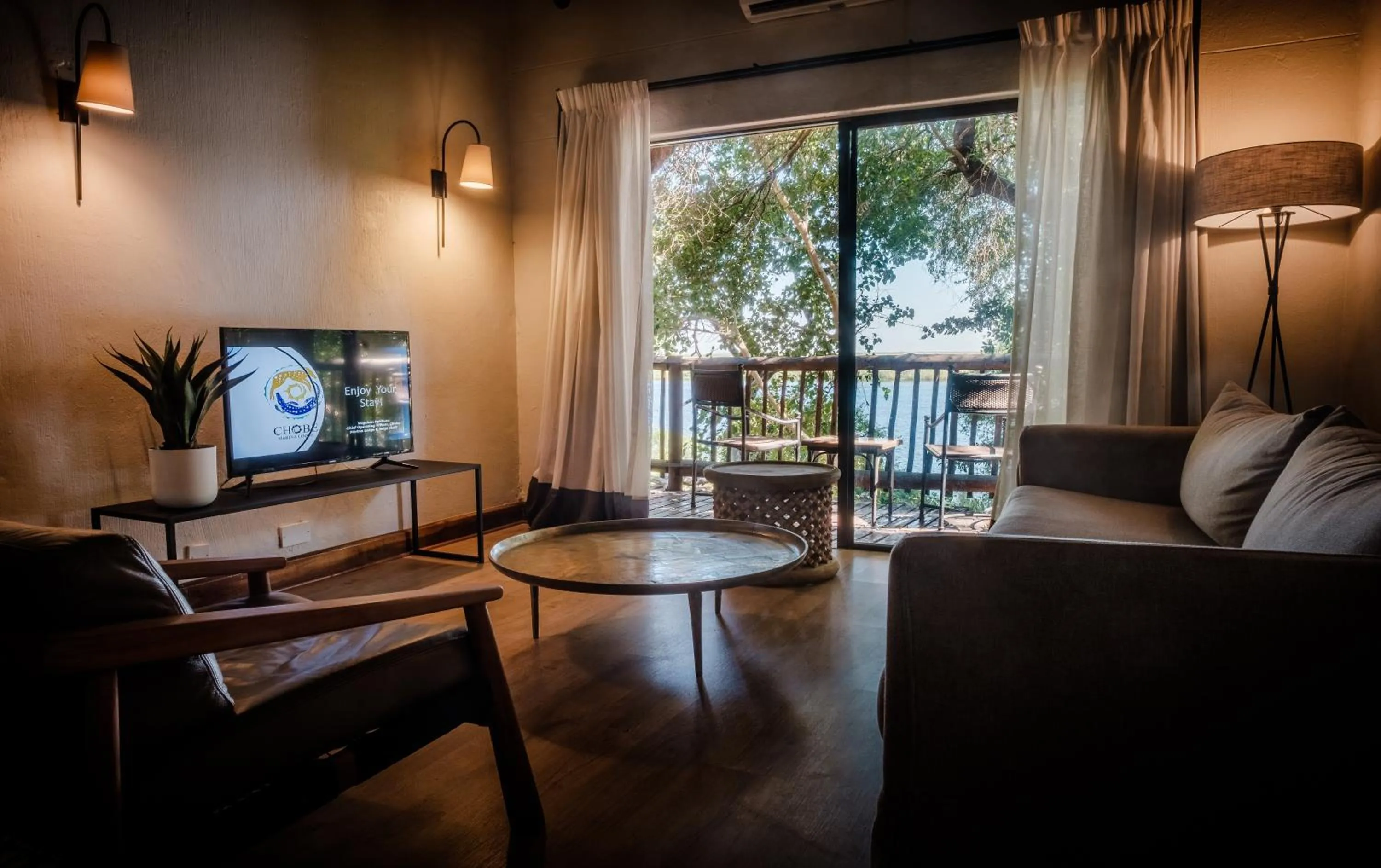 Communal lounge/ TV room in Chobe Marina Lodge