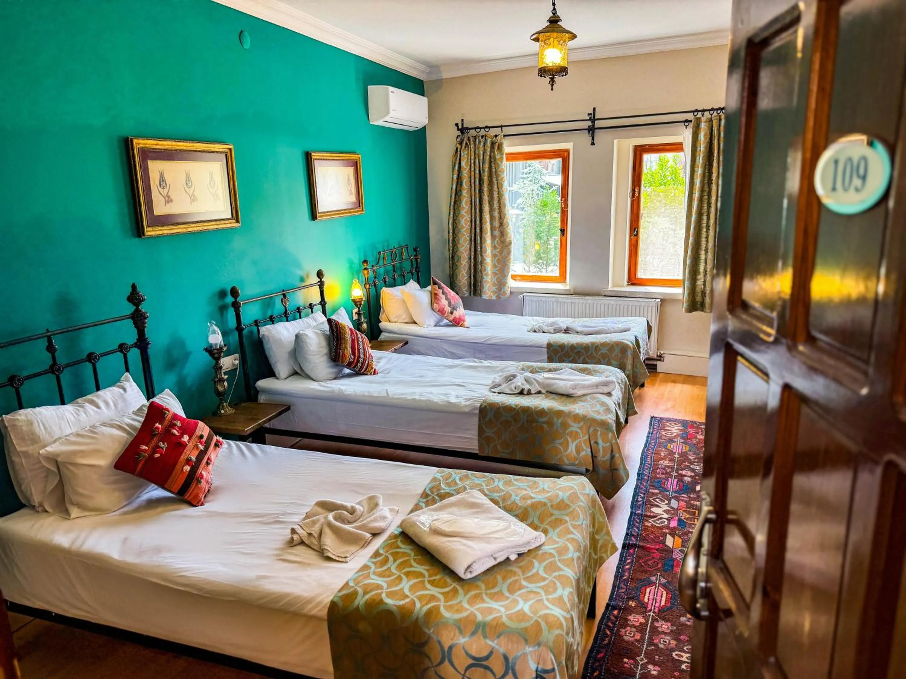 Bed in Nomads Cave Hotel & Rooftop