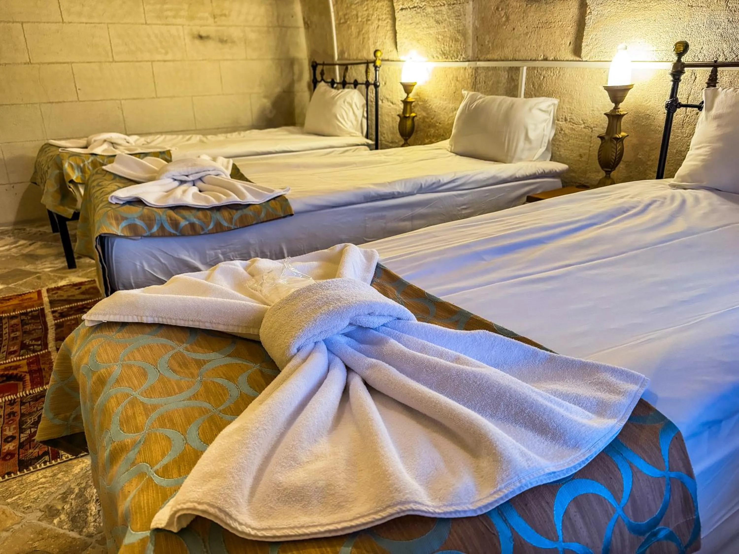 Bed in Nomads Cave Hotel & Rooftop