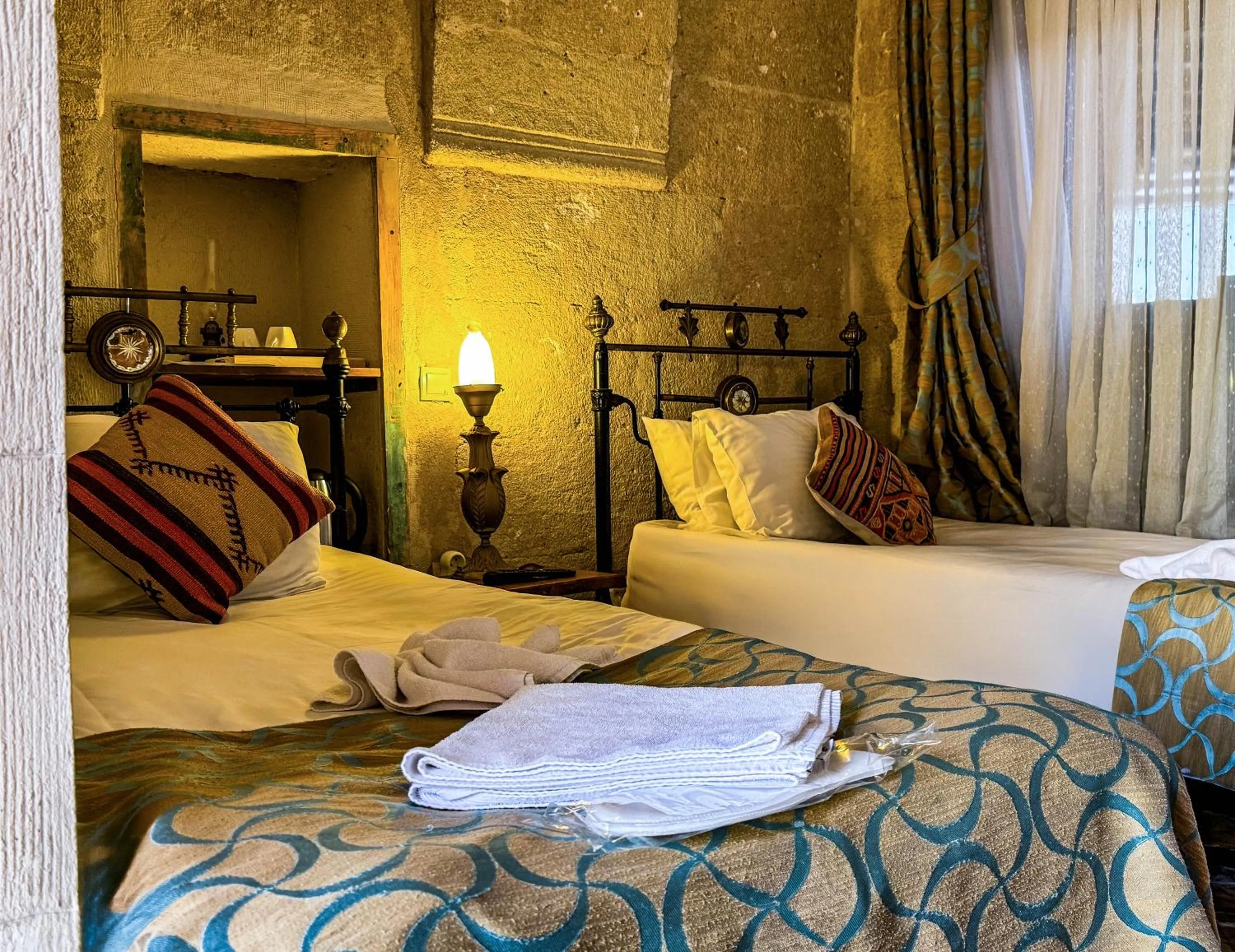 Bed in Nomads Cave Hotel & Rooftop