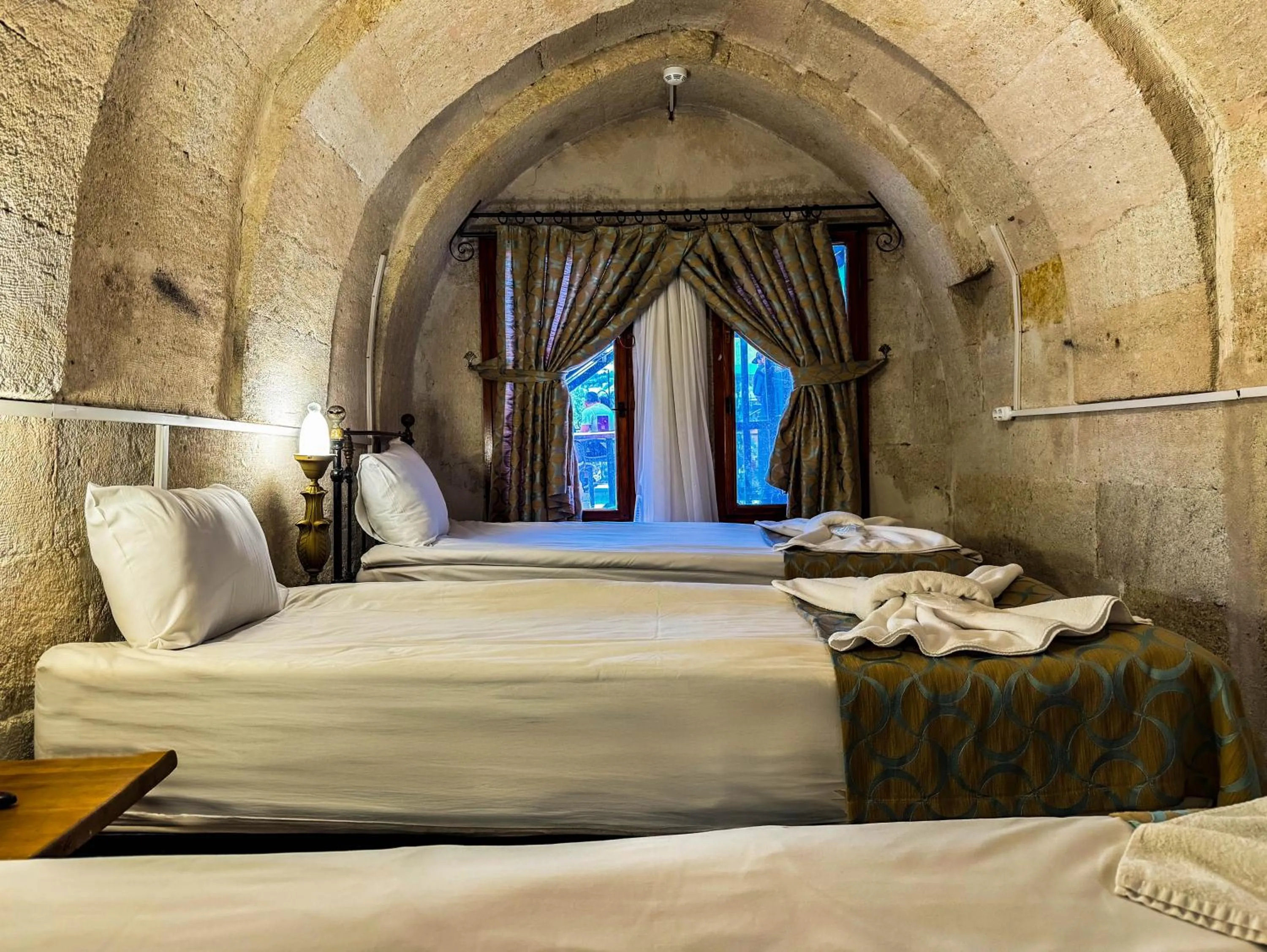 Bed in Nomads Cave Hotel & Rooftop