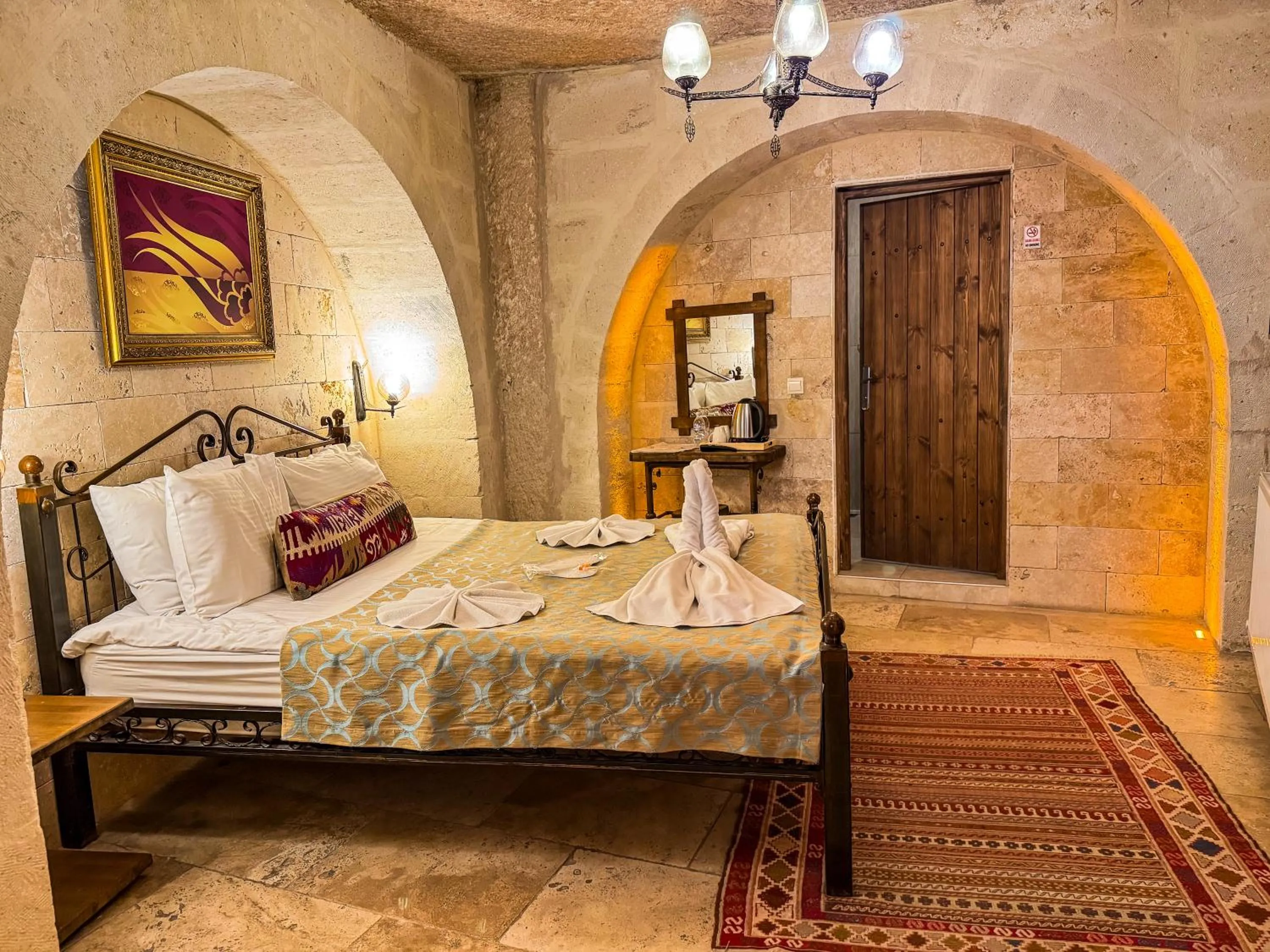 Bed in Nomads Cave Hotel & Rooftop