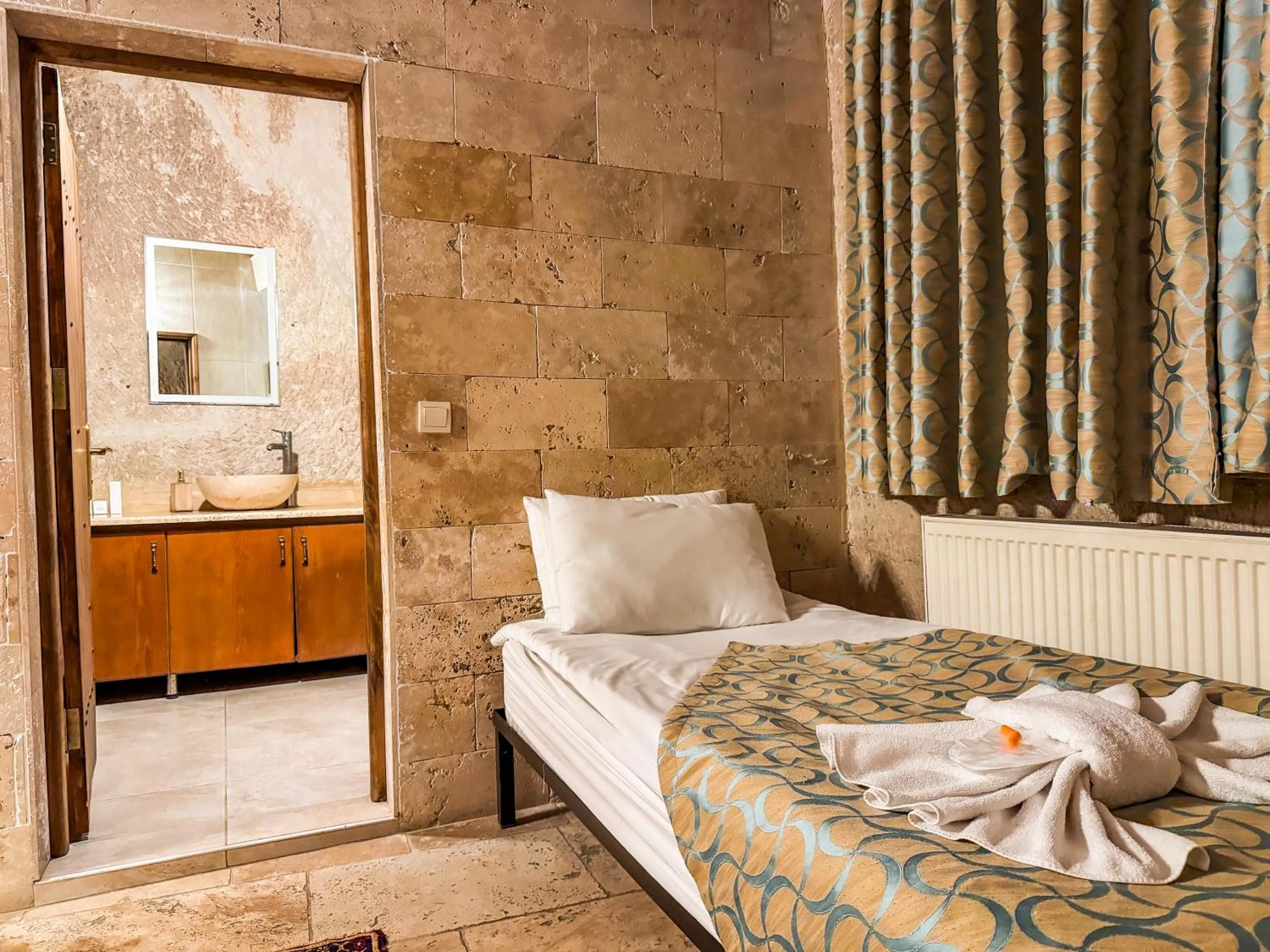 Bed in Nomads Cave Hotel & Rooftop