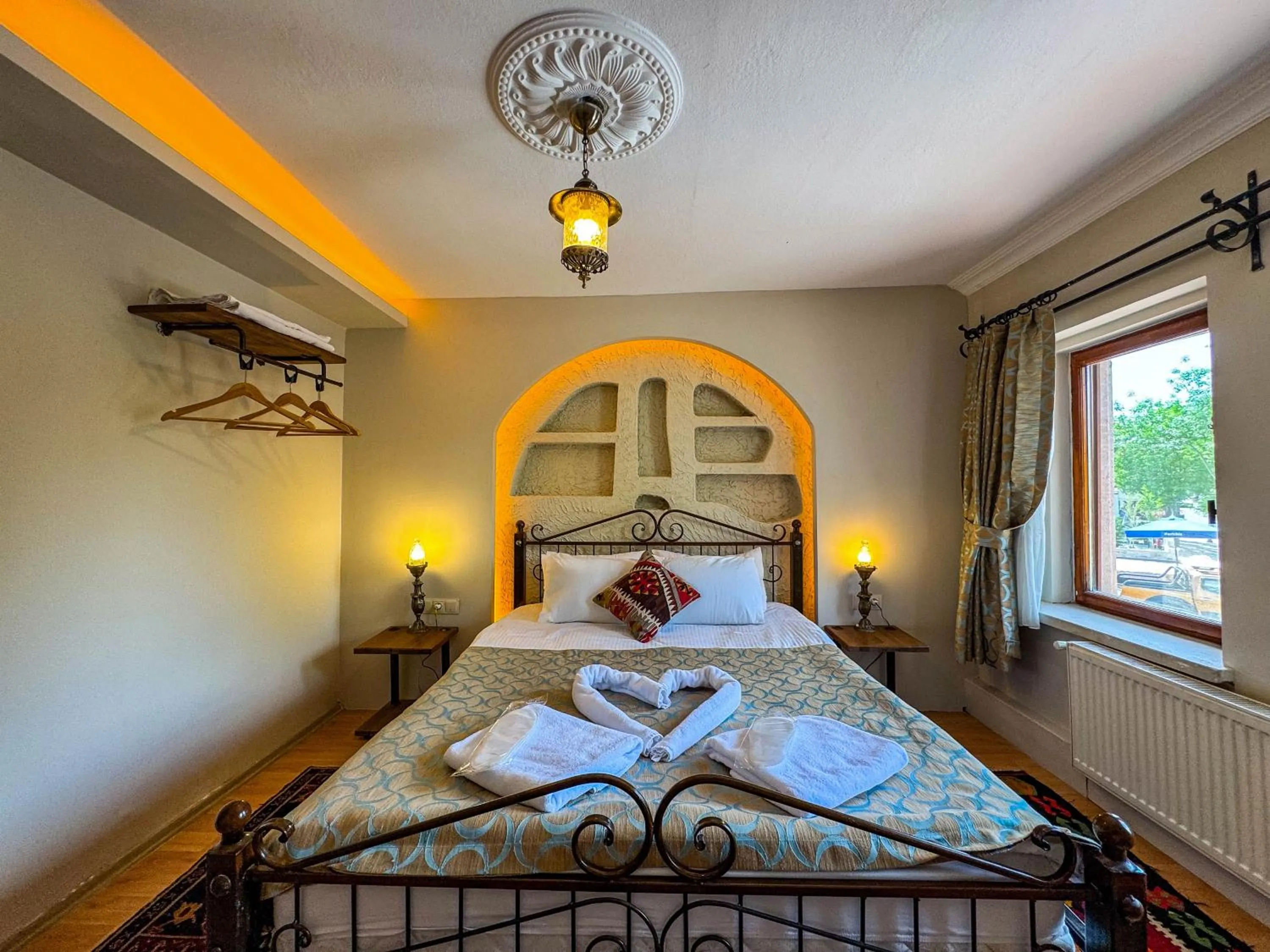 Bed in Nomads Cave Hotel & Rooftop