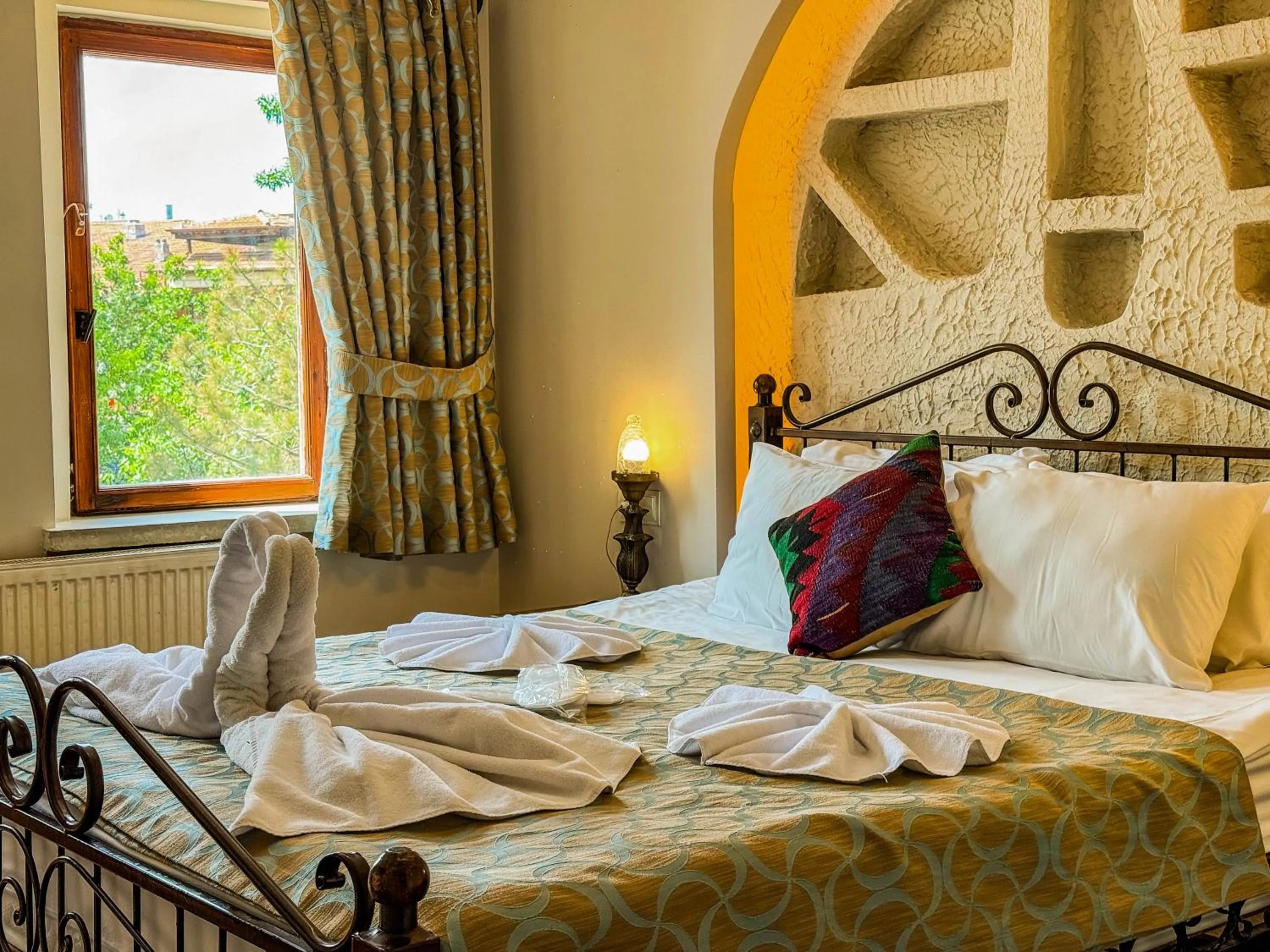 Bed in Nomads Cave Hotel & Rooftop