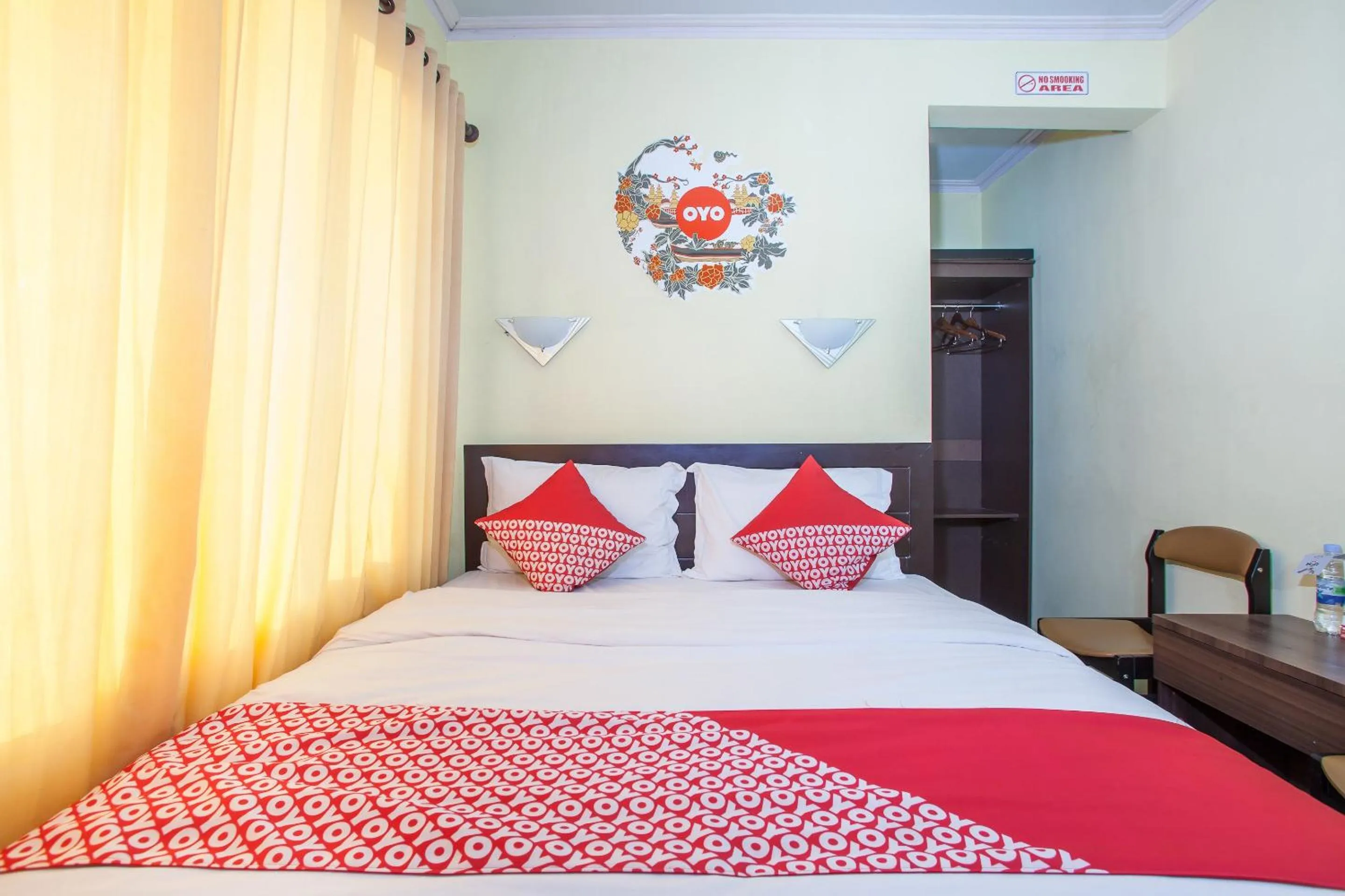 Bedroom in Capital O 887 Green Hill Hotel And Convention Center