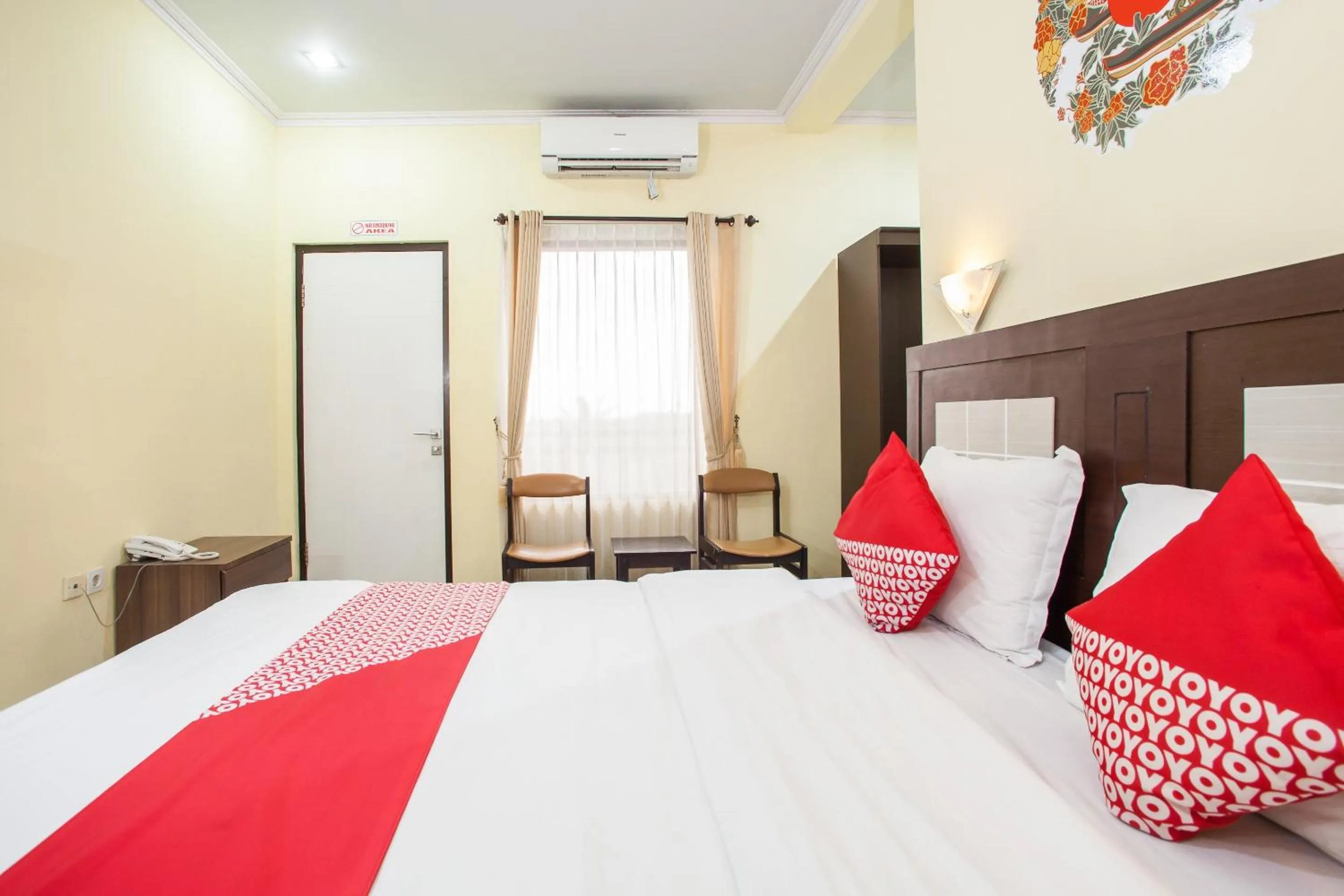 Bedroom in Capital O 887 Green Hill Hotel And Convention Center