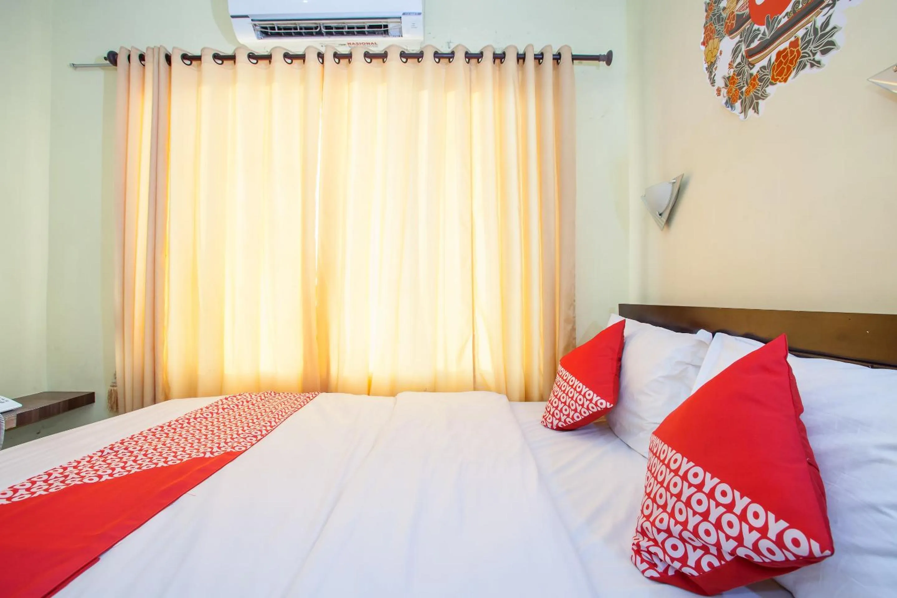 Bedroom in Capital O 887 Green Hill Hotel And Convention Center