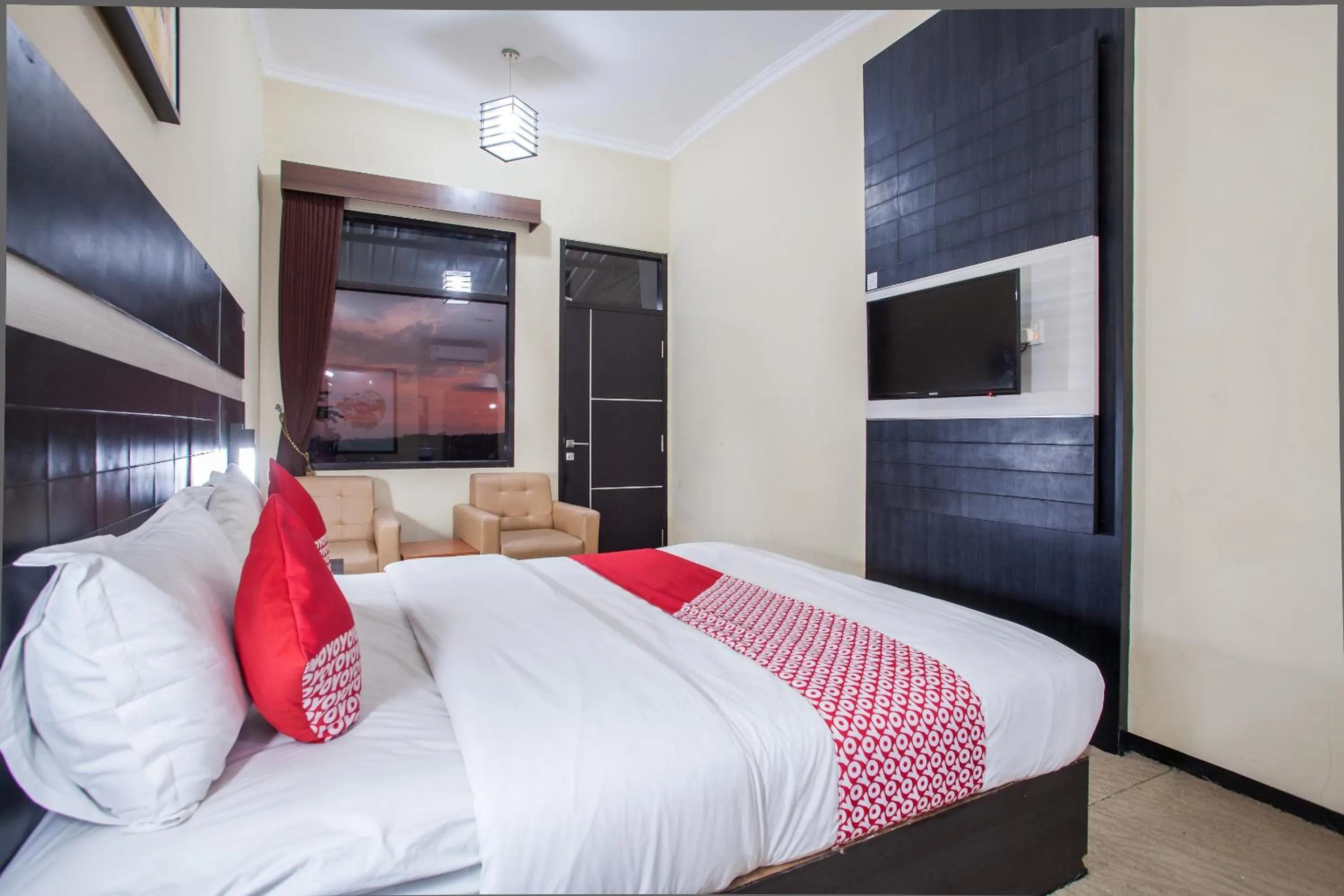 Bedroom in Capital O 887 Green Hill Hotel And Convention Center