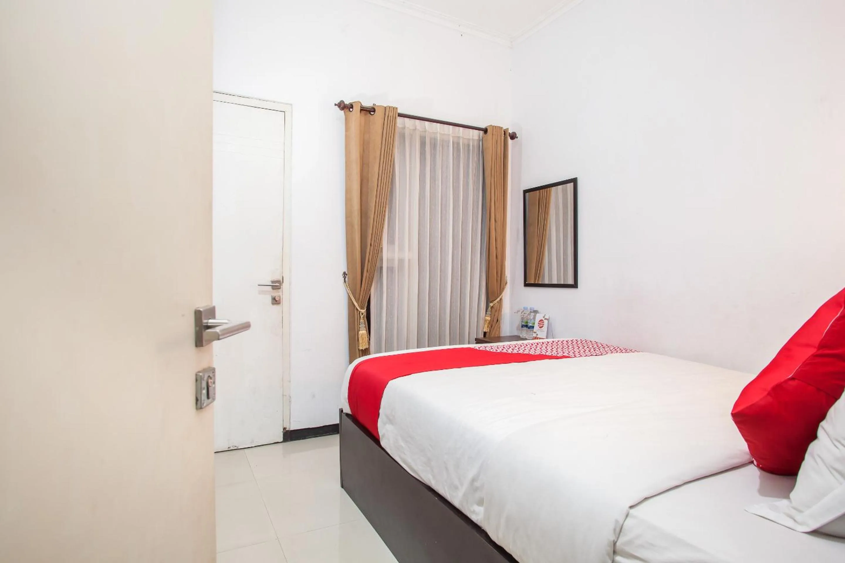 Bedroom in Capital O 887 Green Hill Hotel And Convention Center