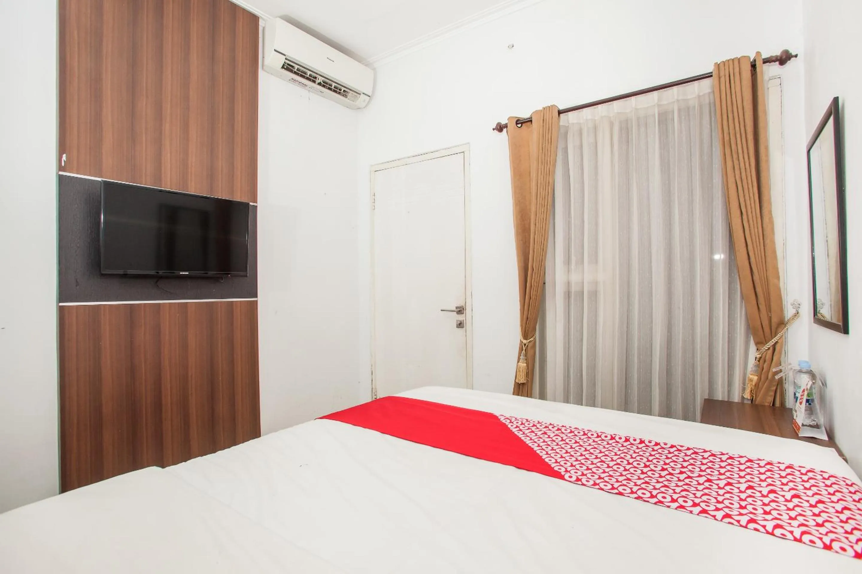 Bedroom in Capital O 887 Green Hill Hotel And Convention Center