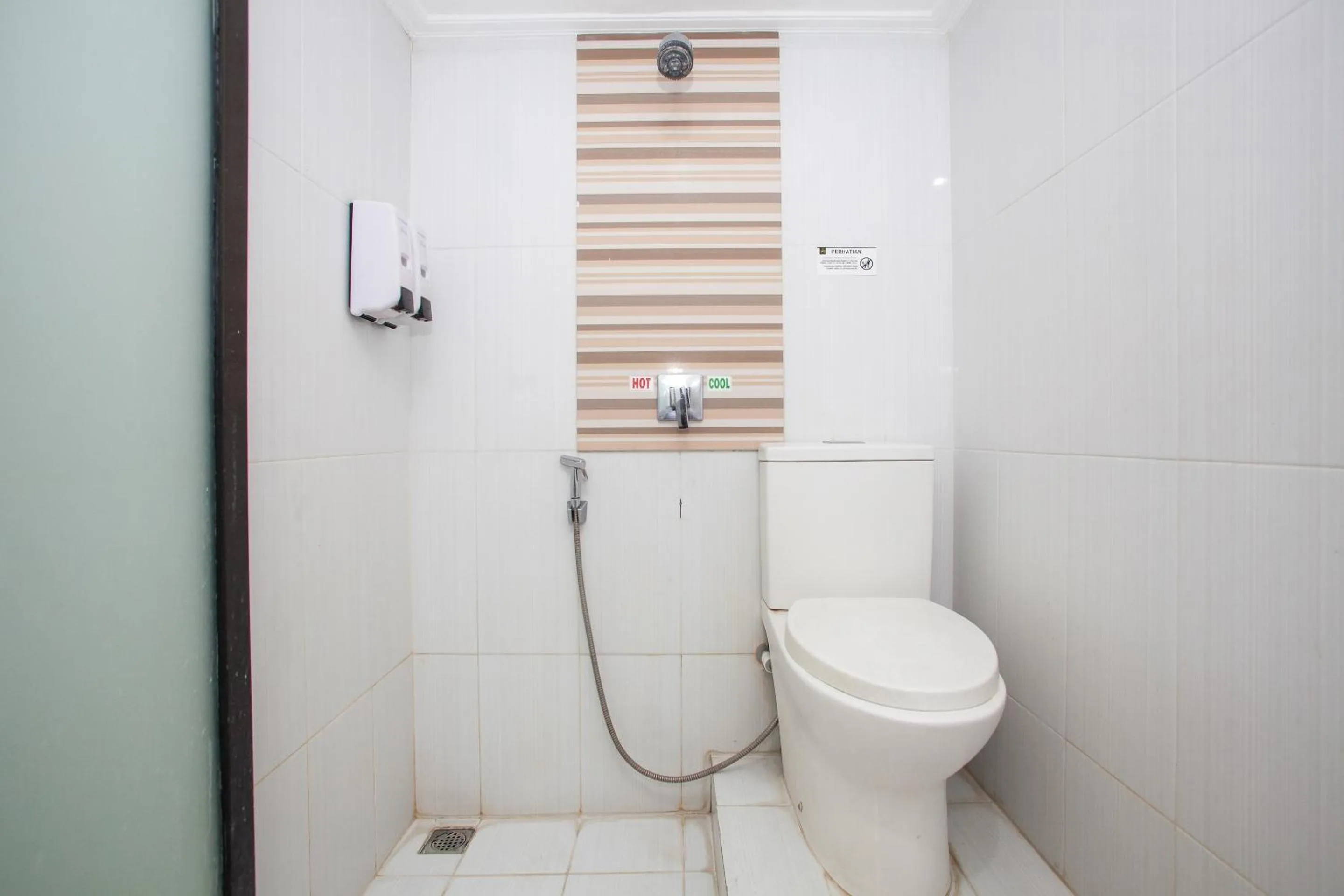 Bathroom in Capital O 887 Green Hill Hotel And Convention Center