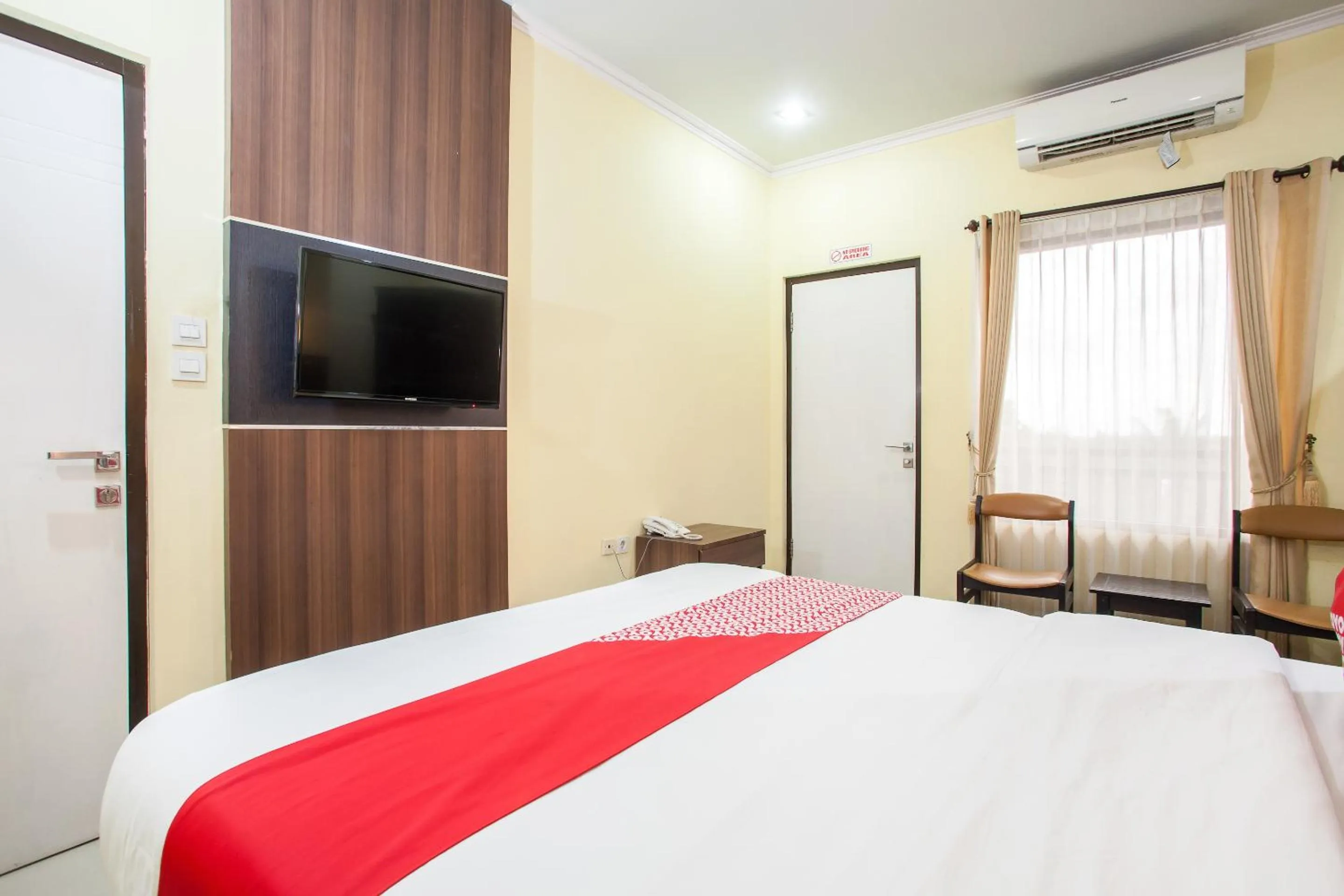 Bedroom in Capital O 887 Green Hill Hotel And Convention Center