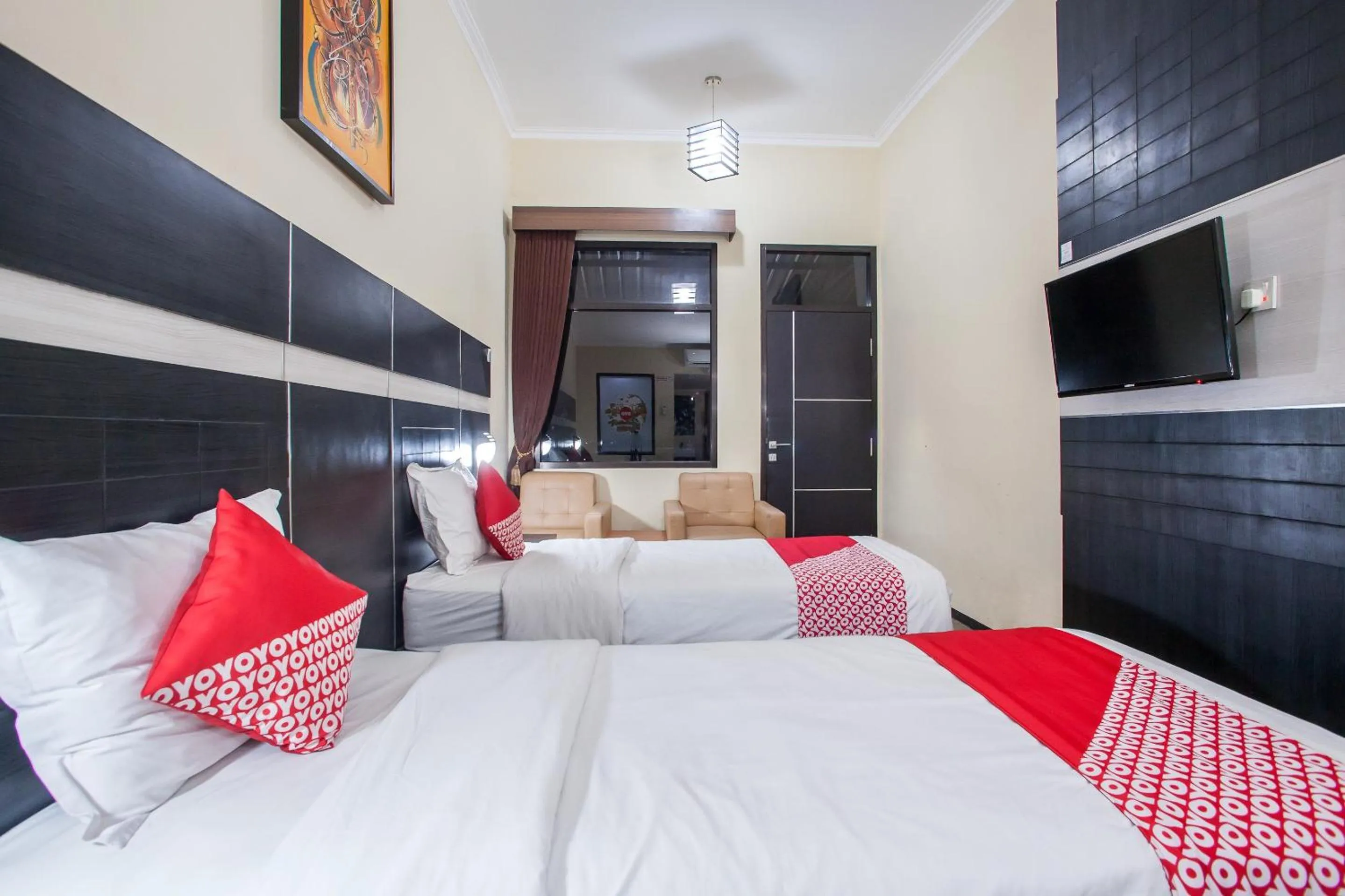 Bedroom in Capital O 887 Green Hill Hotel And Convention Center