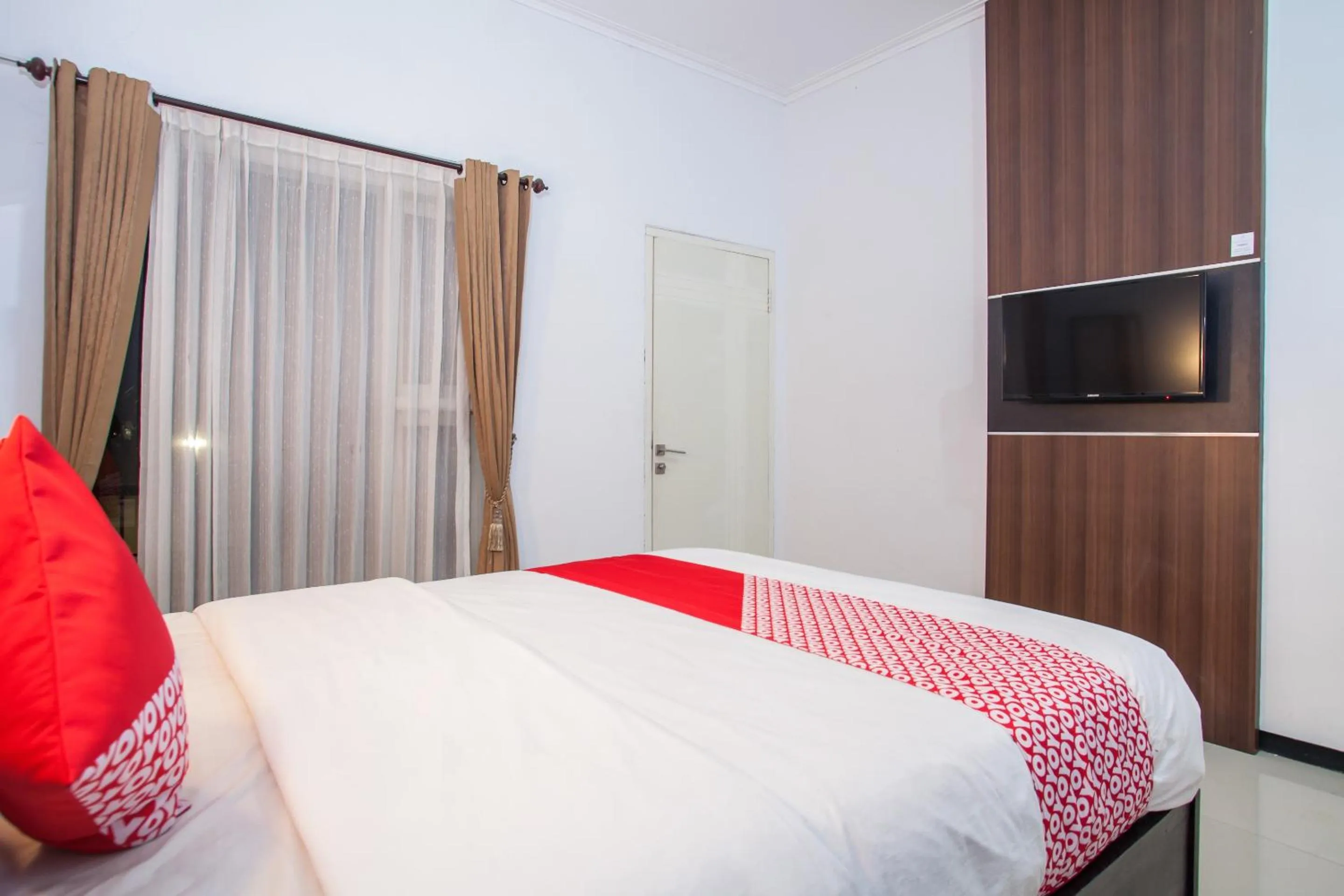 Bedroom in Capital O 887 Green Hill Hotel And Convention Center