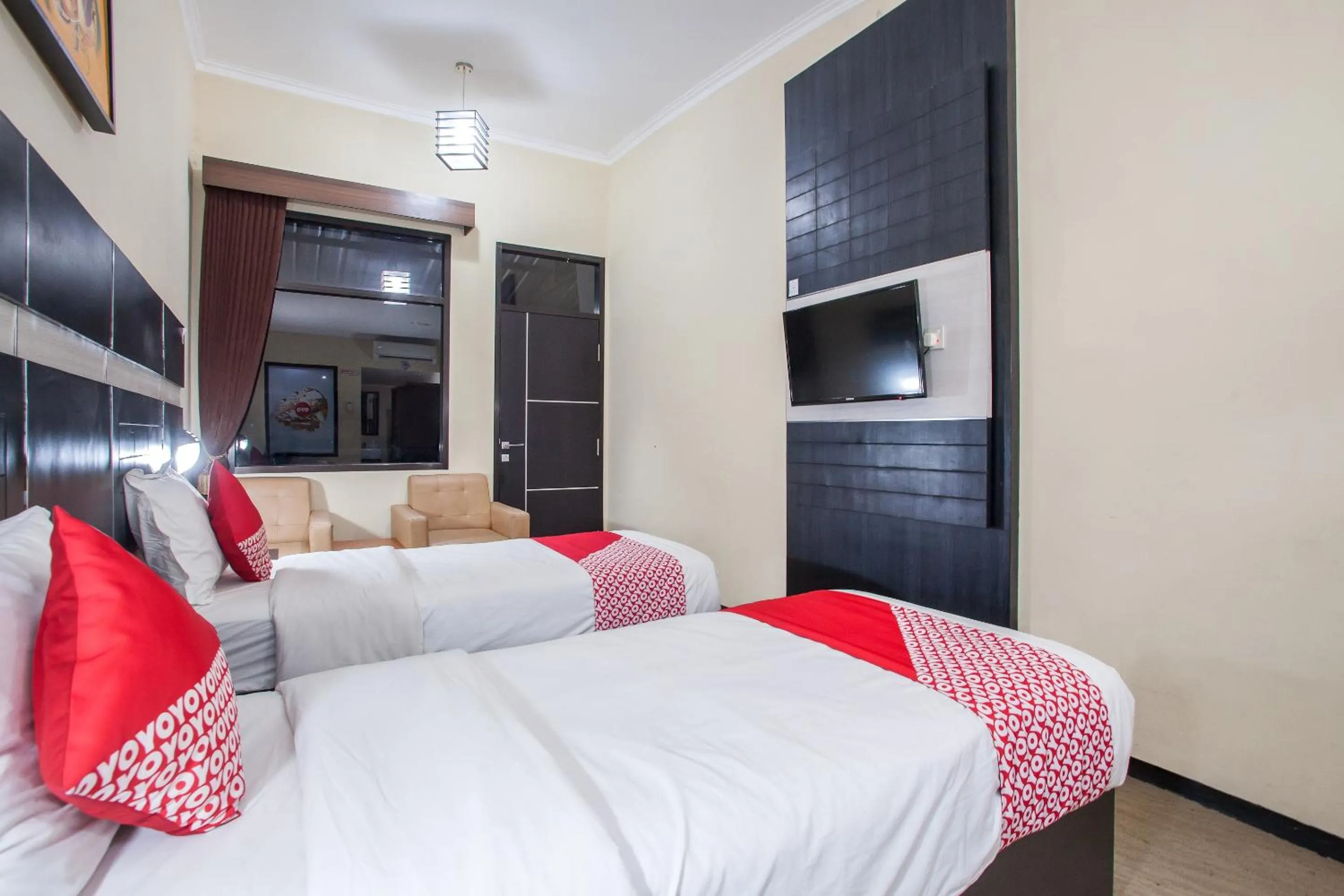 Bedroom in Capital O 887 Green Hill Hotel And Convention Center