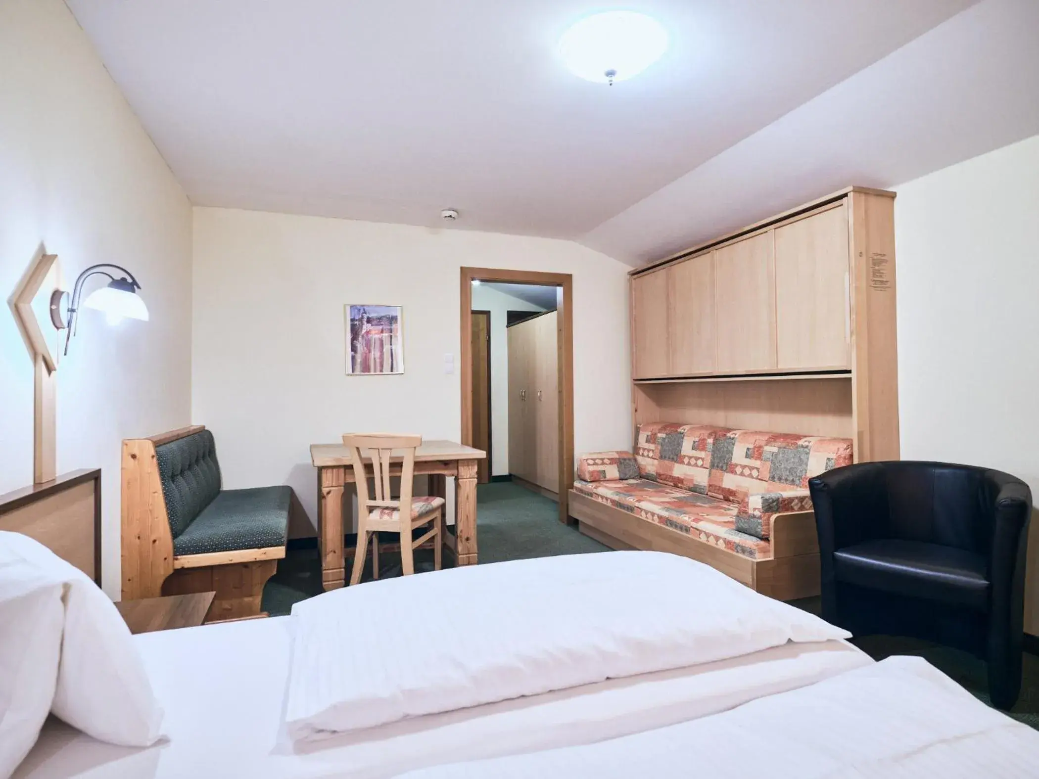 Double Room with two Extra Beds in Hotel Kirchboden by Alpeffect Hotels Double Room with two Extra Beds in Hotel Kirchboden by Alpeffect Hotels