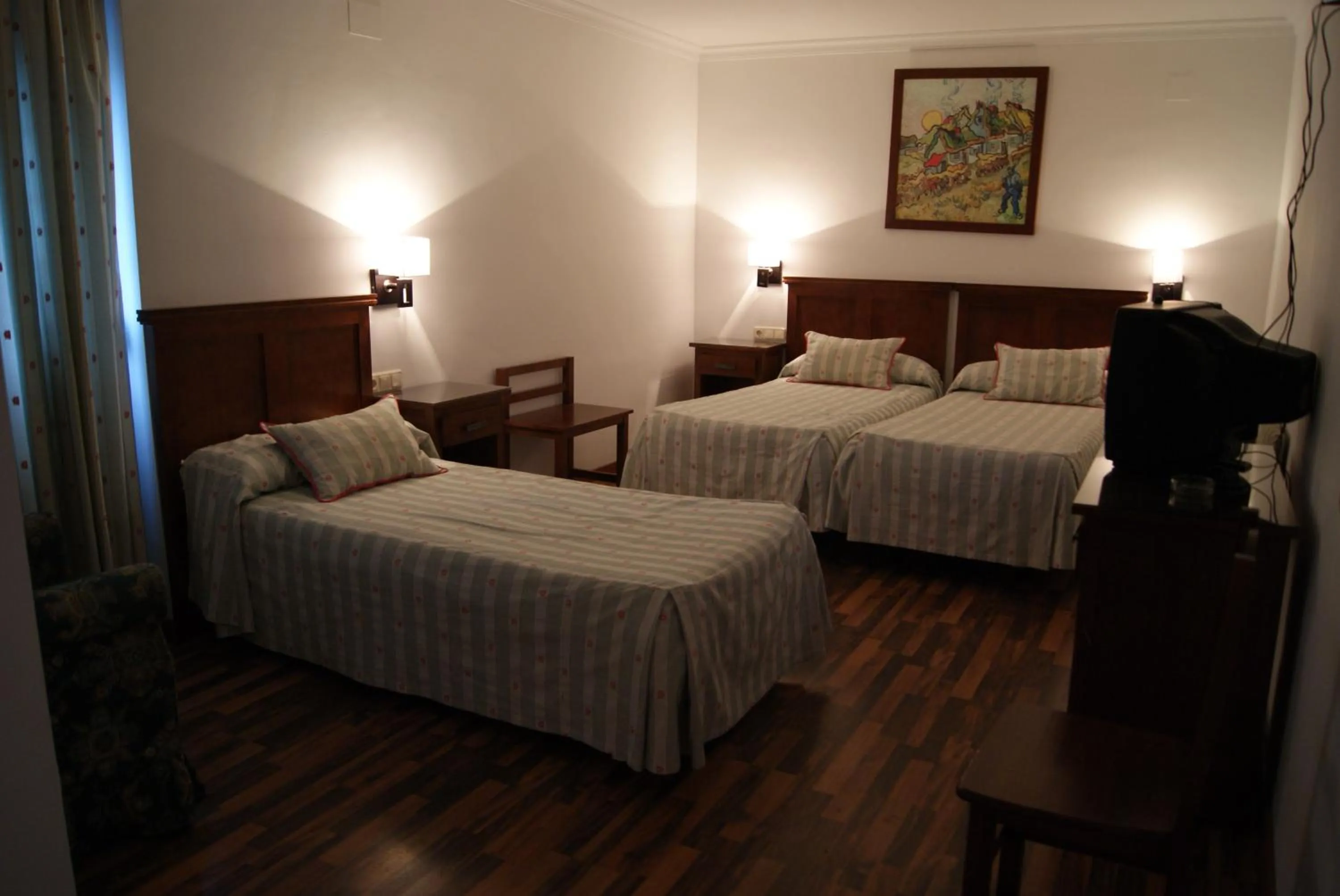 Bed in Hotel Mulhacen