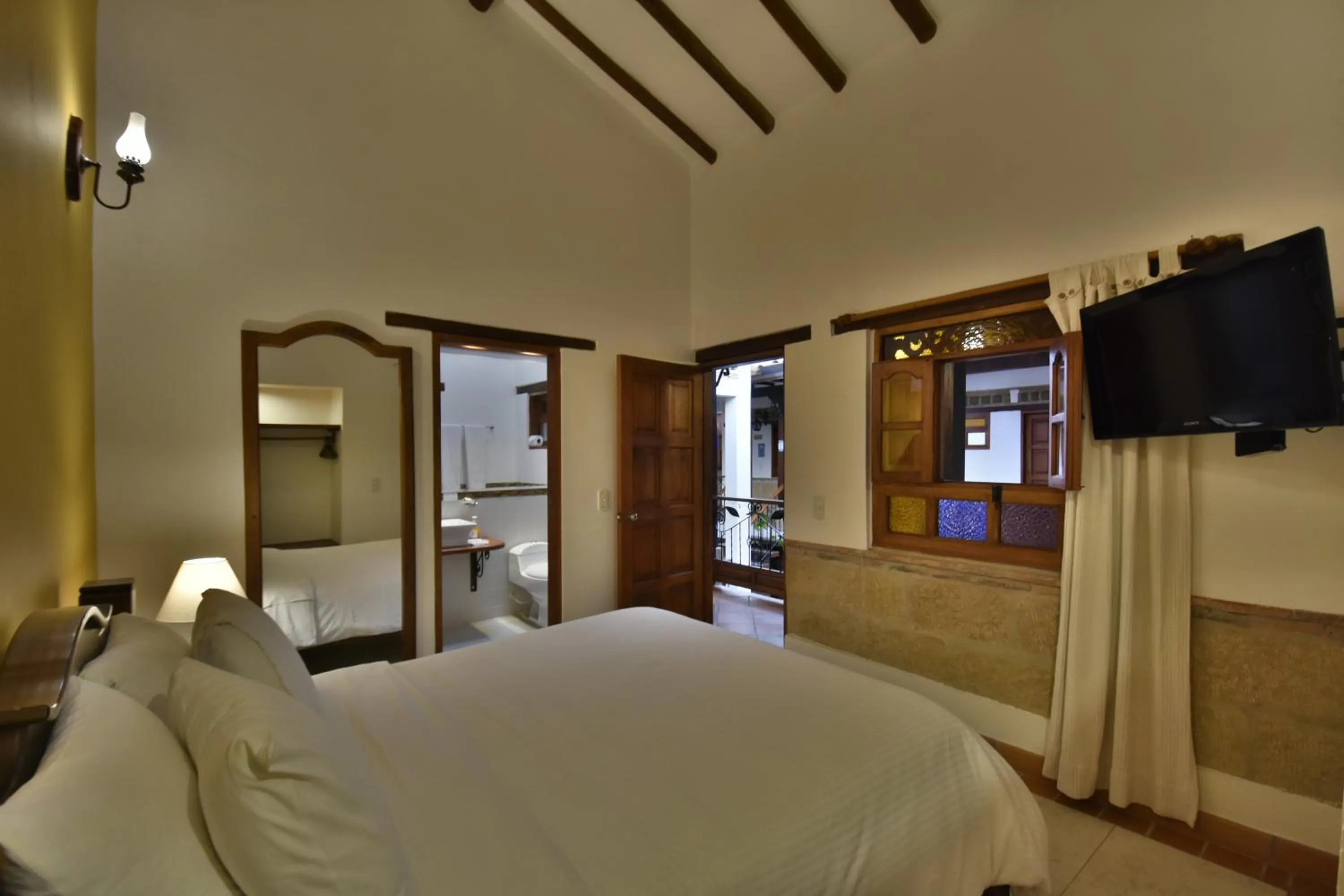 Bed in Hotel Jardines De La Villa