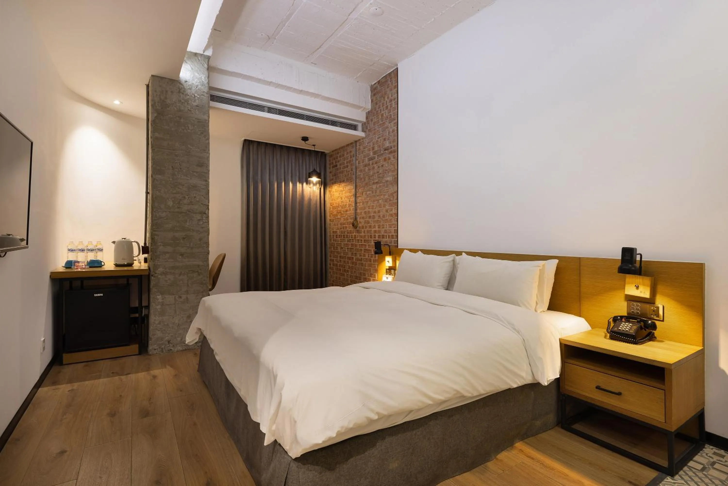 Bed in BlueSky Hotel