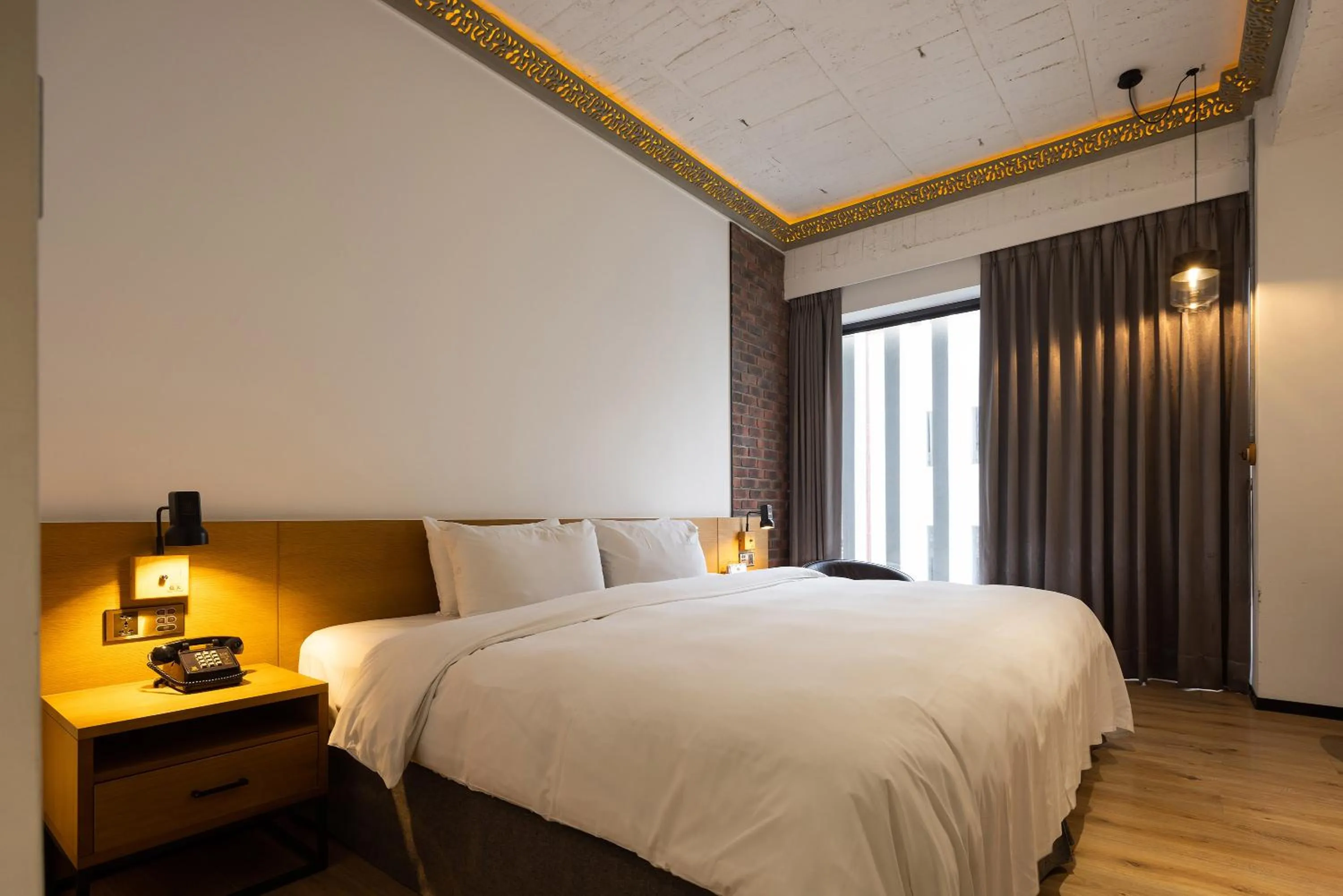 Bed in BlueSky Hotel