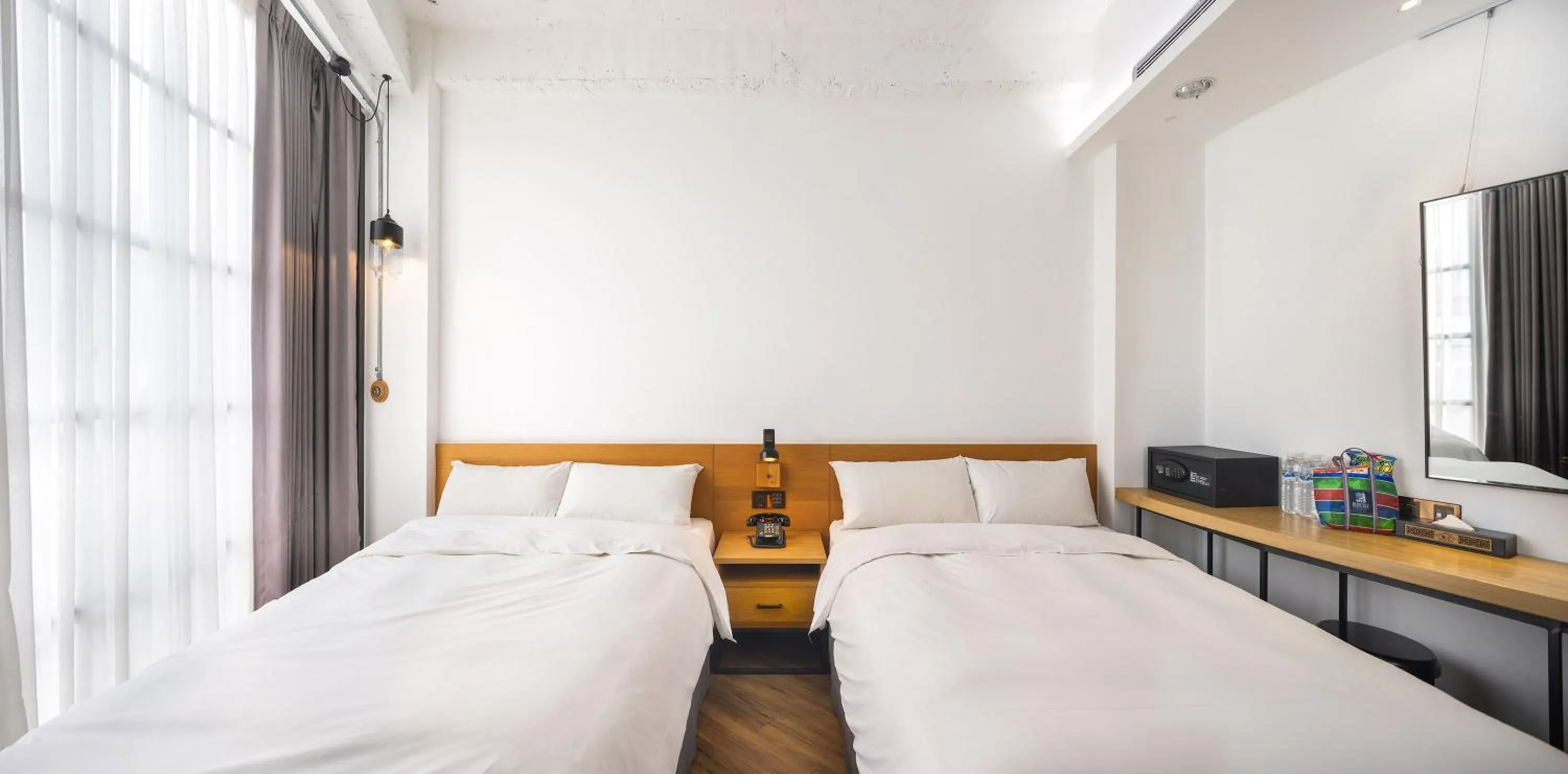 Bed in BlueSky Hotel