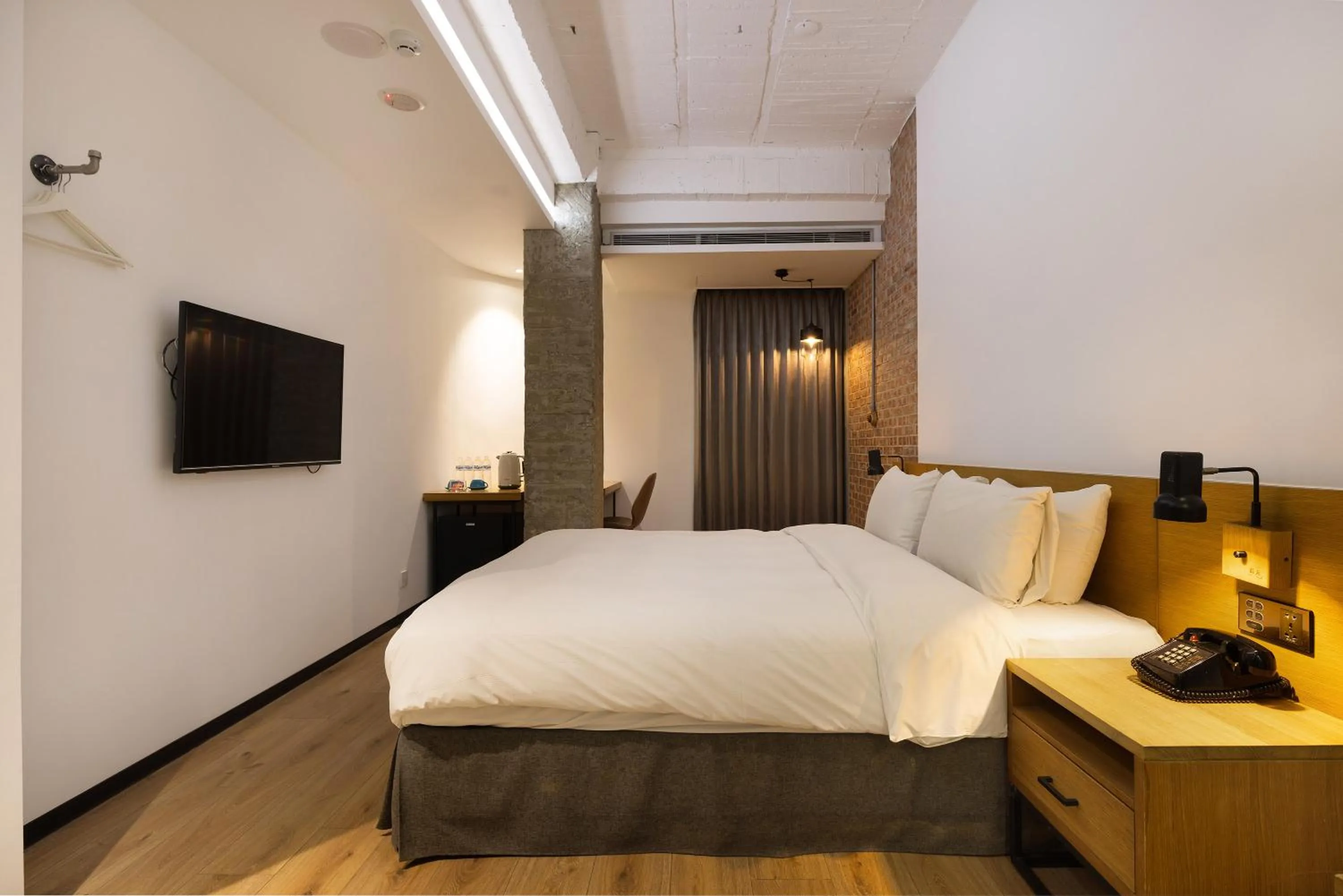 Bed in BlueSky Hotel