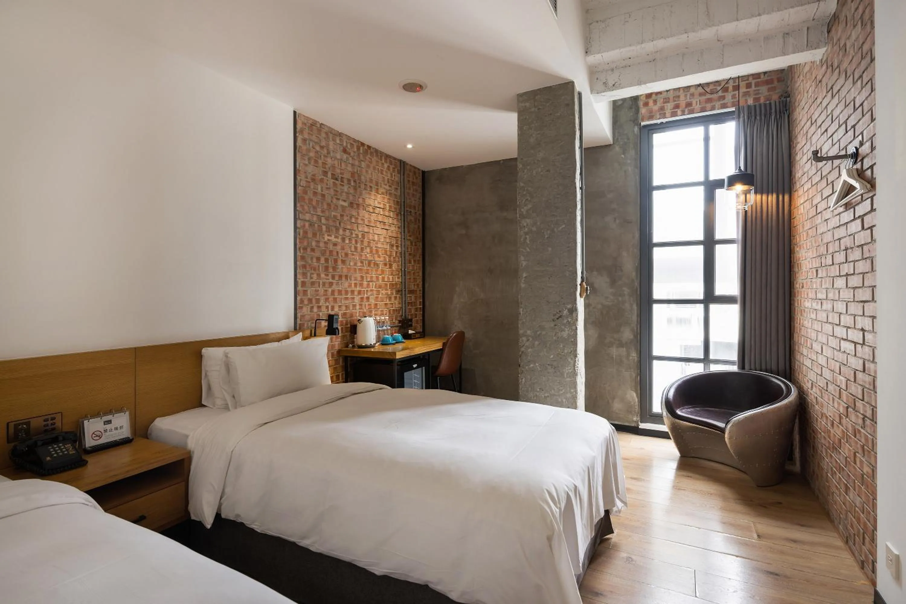 Bed in BlueSky Hotel