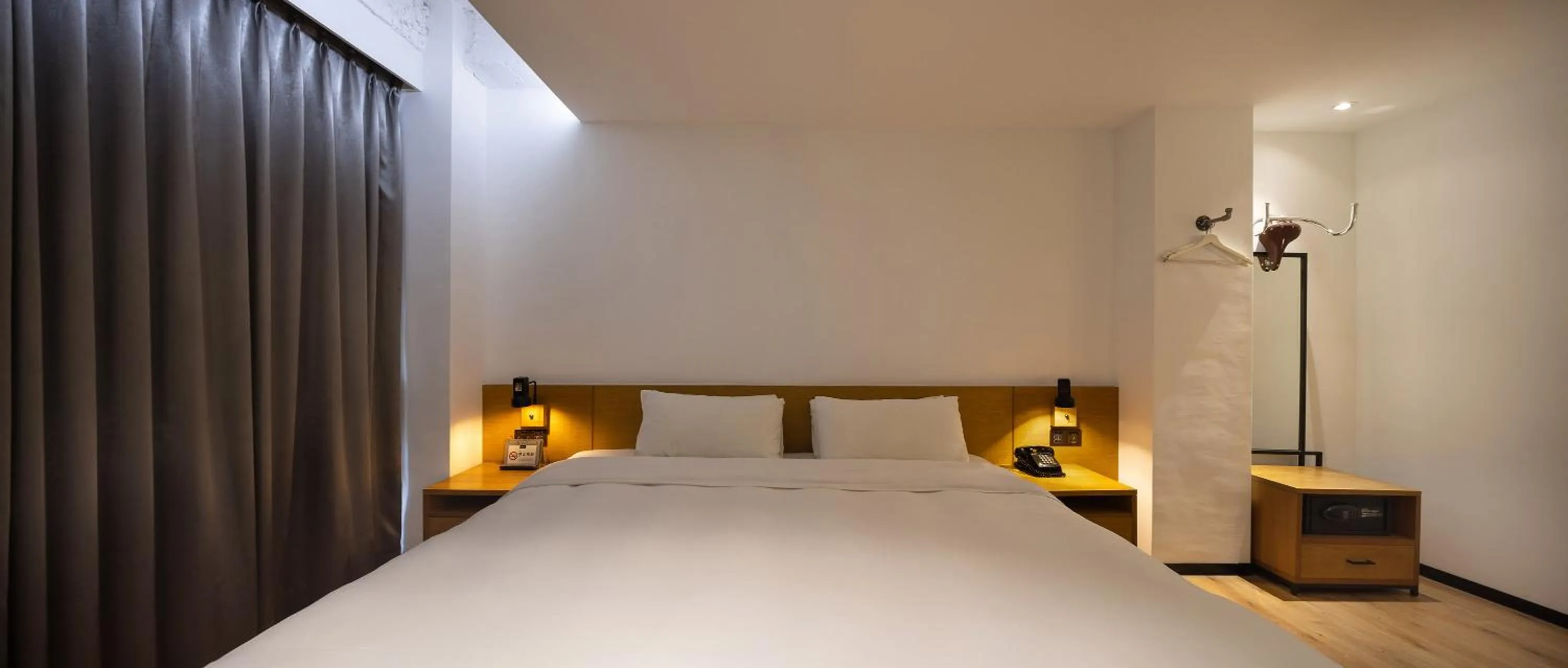 Bed in BlueSky Hotel