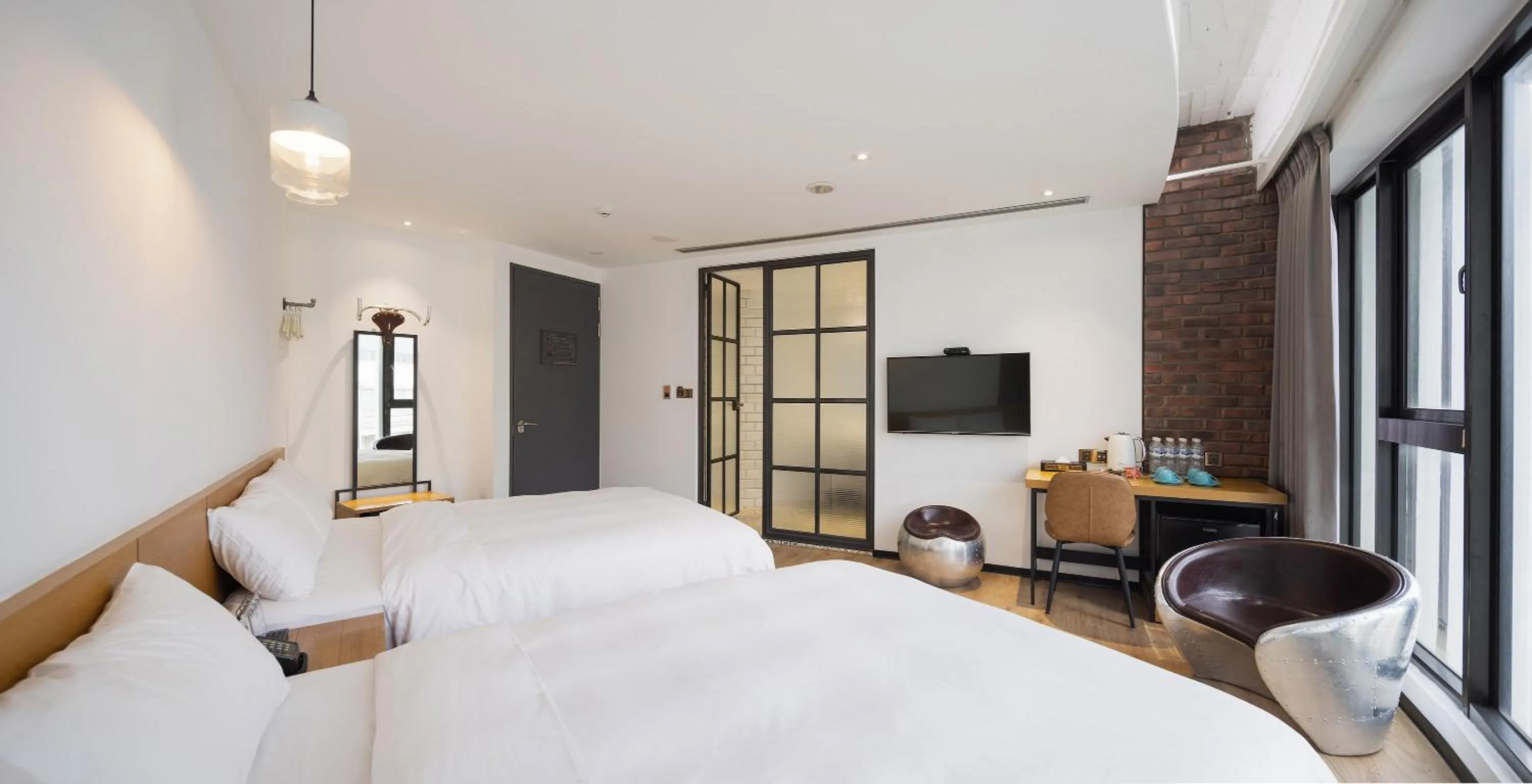 Bed in BlueSky Hotel